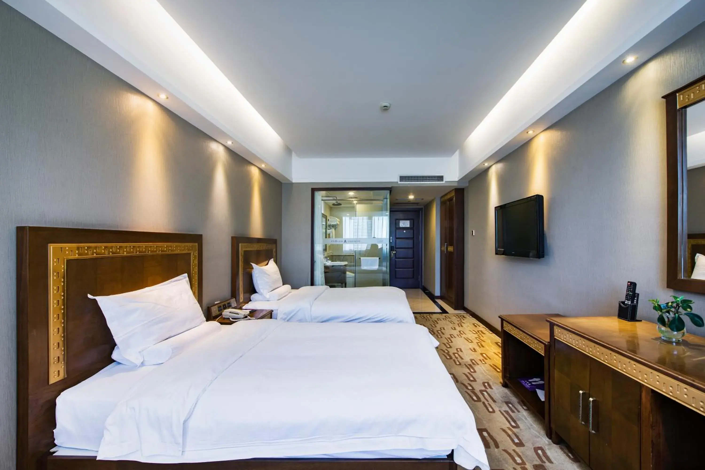 Bed in Sun Moon Lake Hotel Dalian大连火车站店 Bed in Sun Moon Lake Hotel Dalian大连火车站店