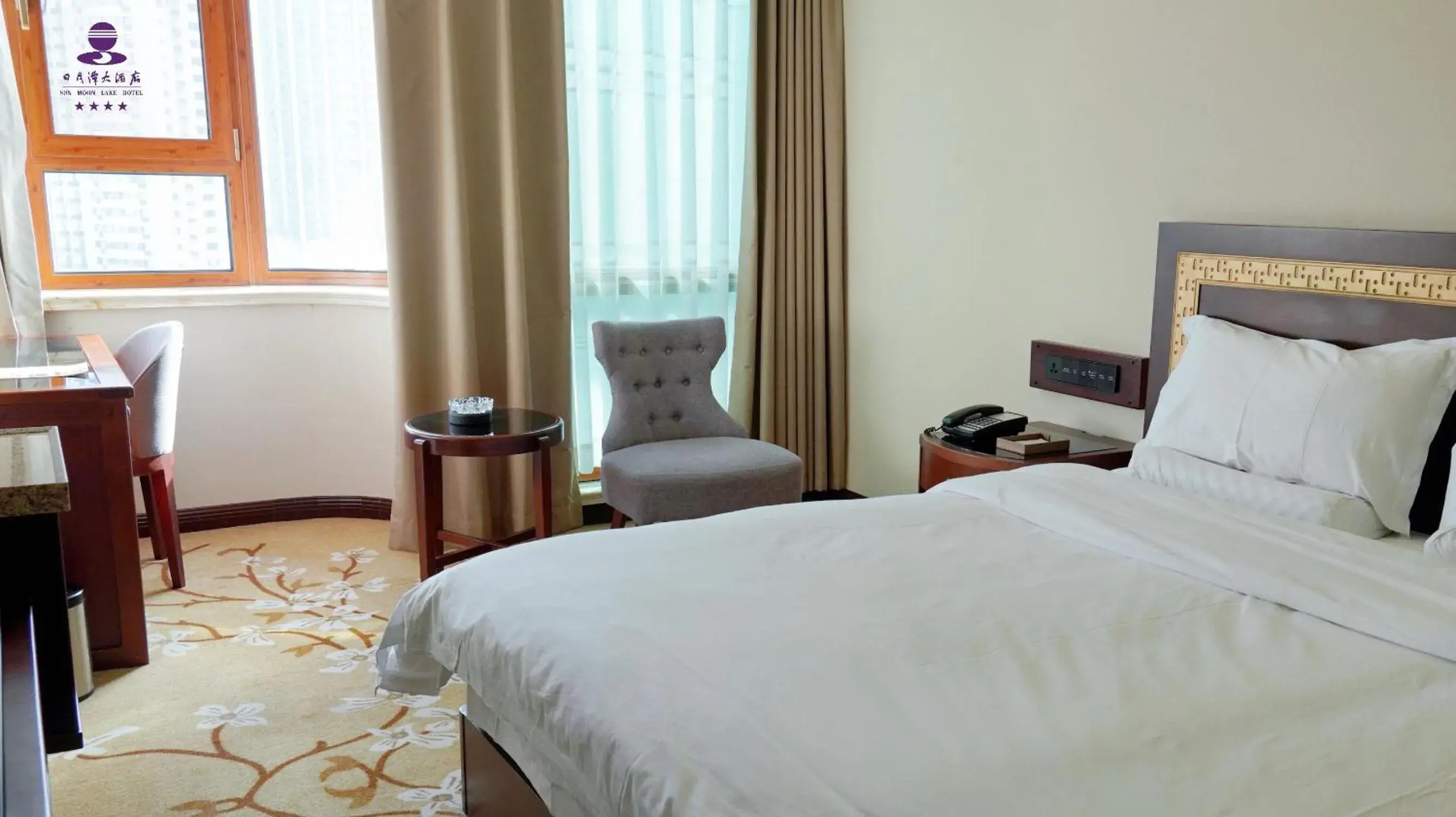 Bed in Sun Moon Lake Hotel Dalian大连火车站店 Bed in Sun Moon Lake Hotel Dalian大连火车站店