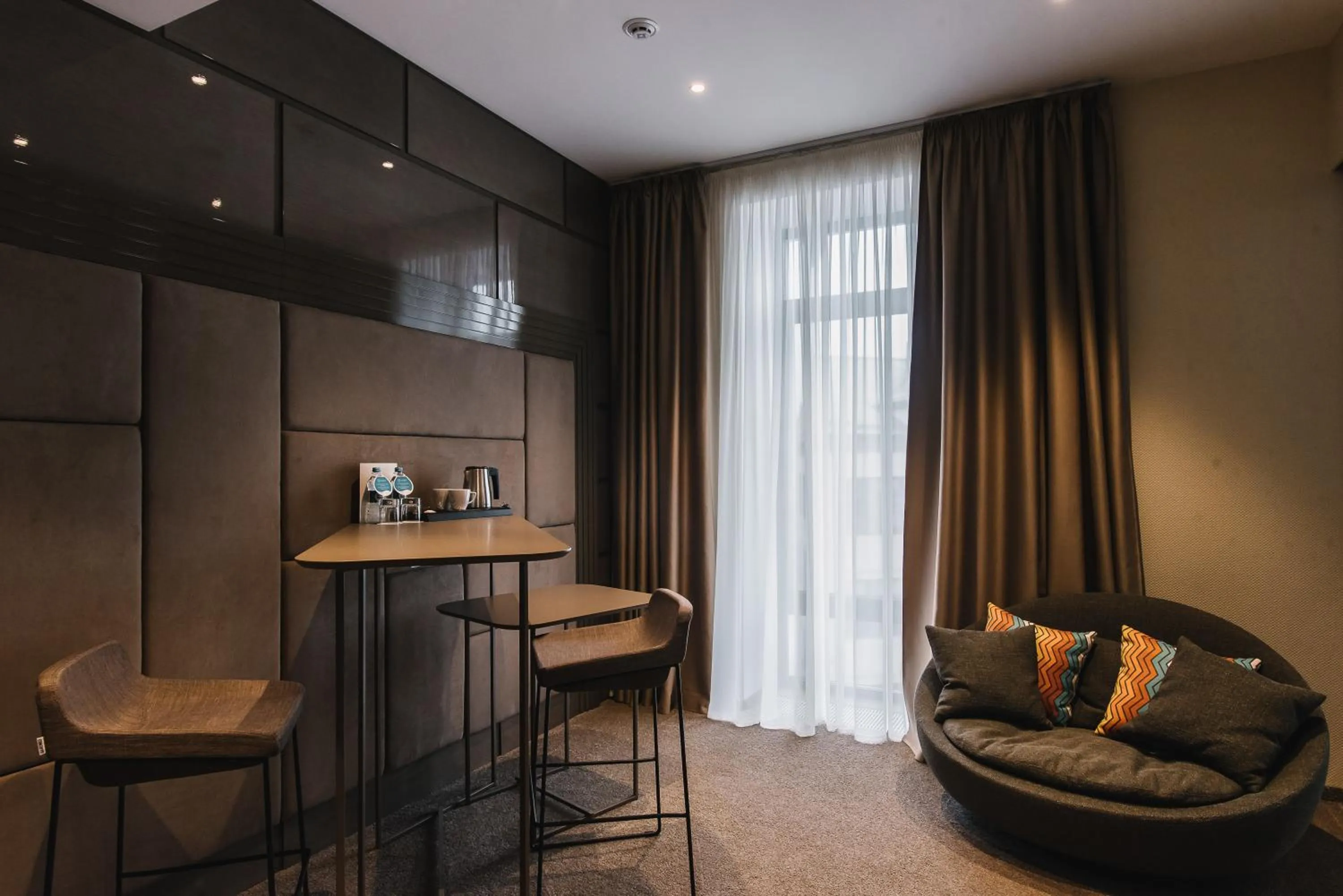 Seating area in Noble Boutique Hotel