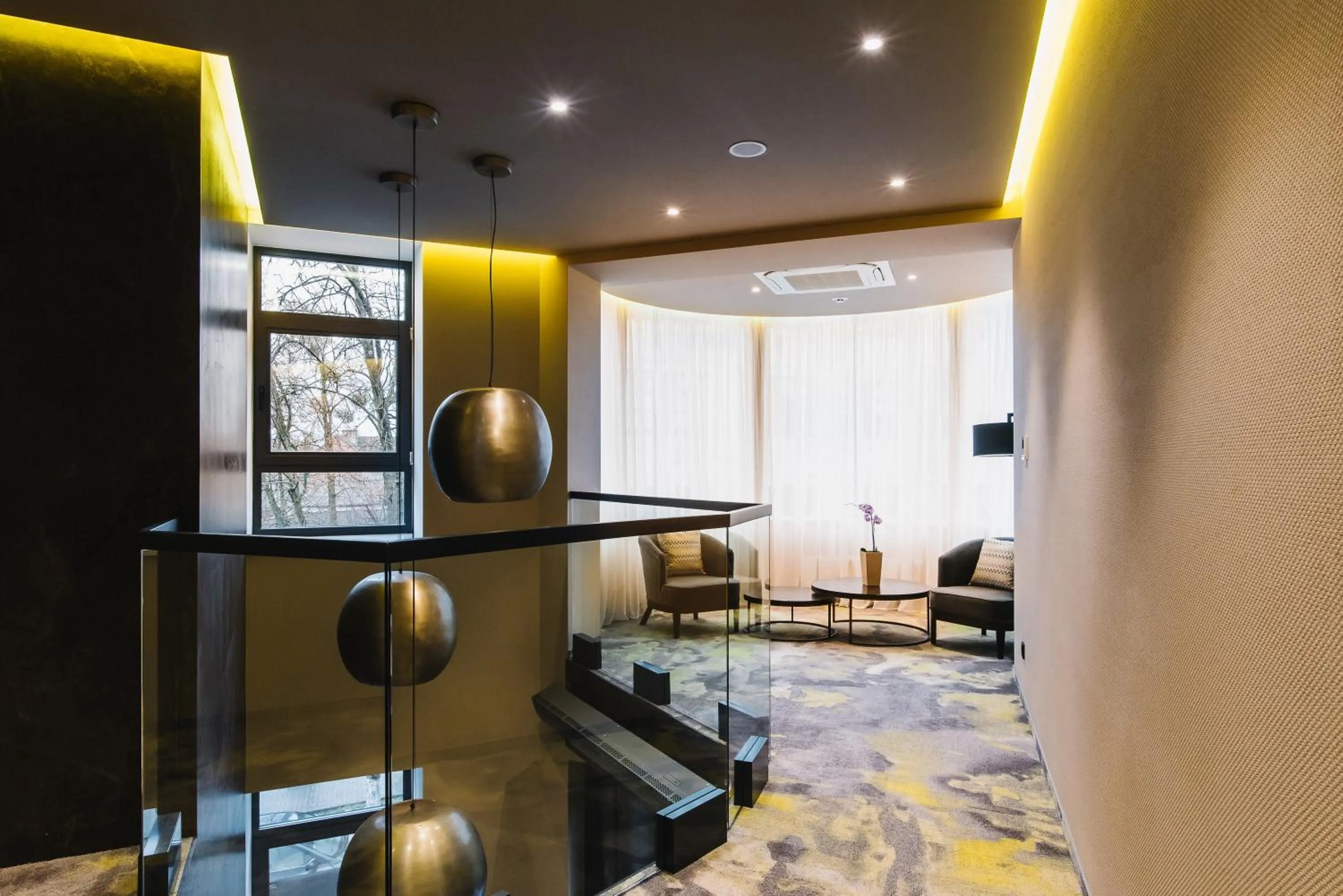 Communal lounge/ TV room in Noble Boutique Hotel