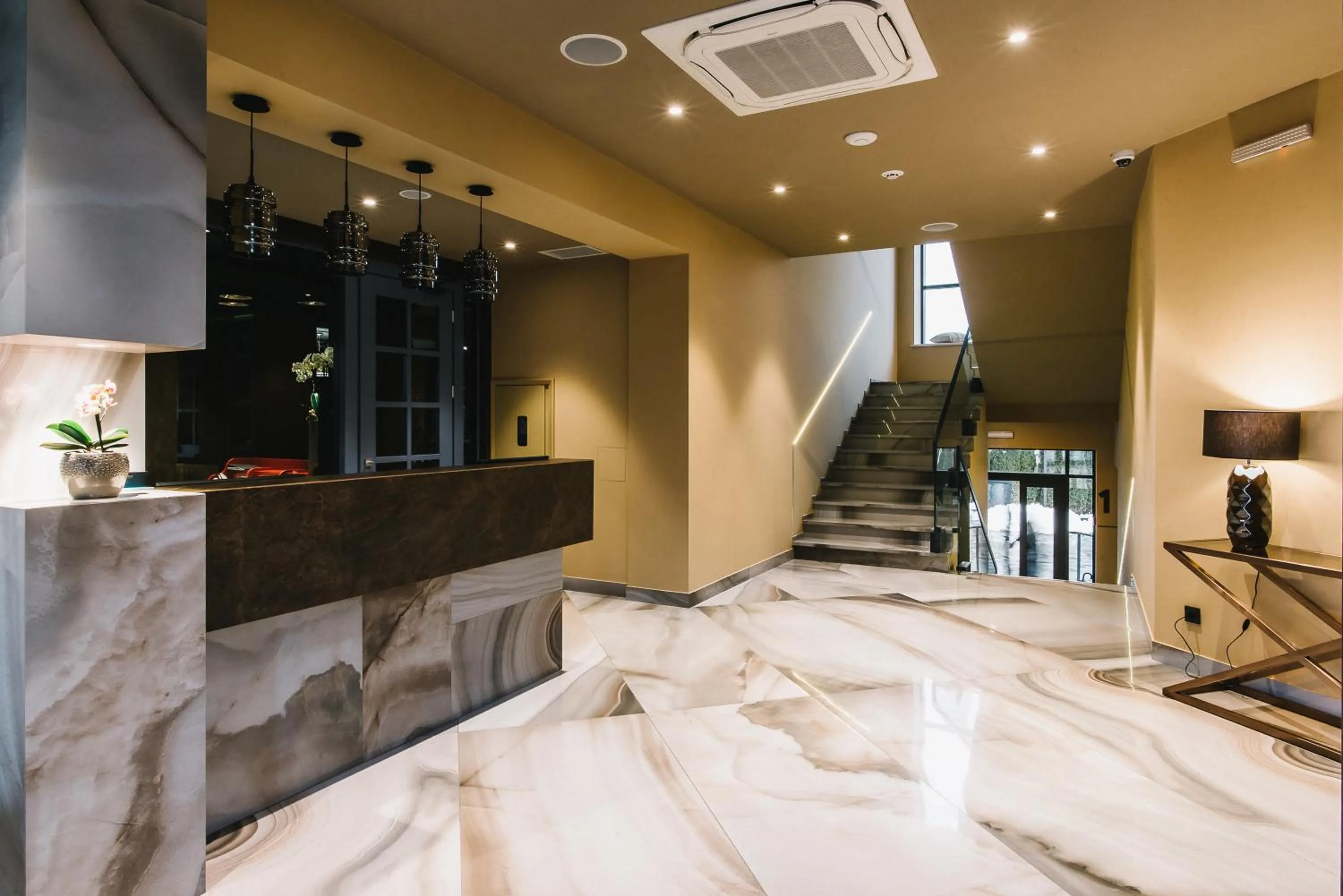 Lobby or reception, Bed in Noble Boutique Hotel