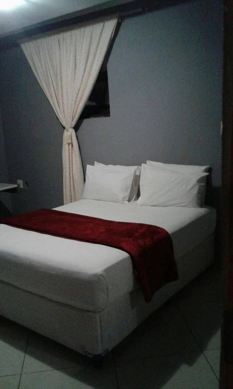 Bed in Central Lodge Hotels