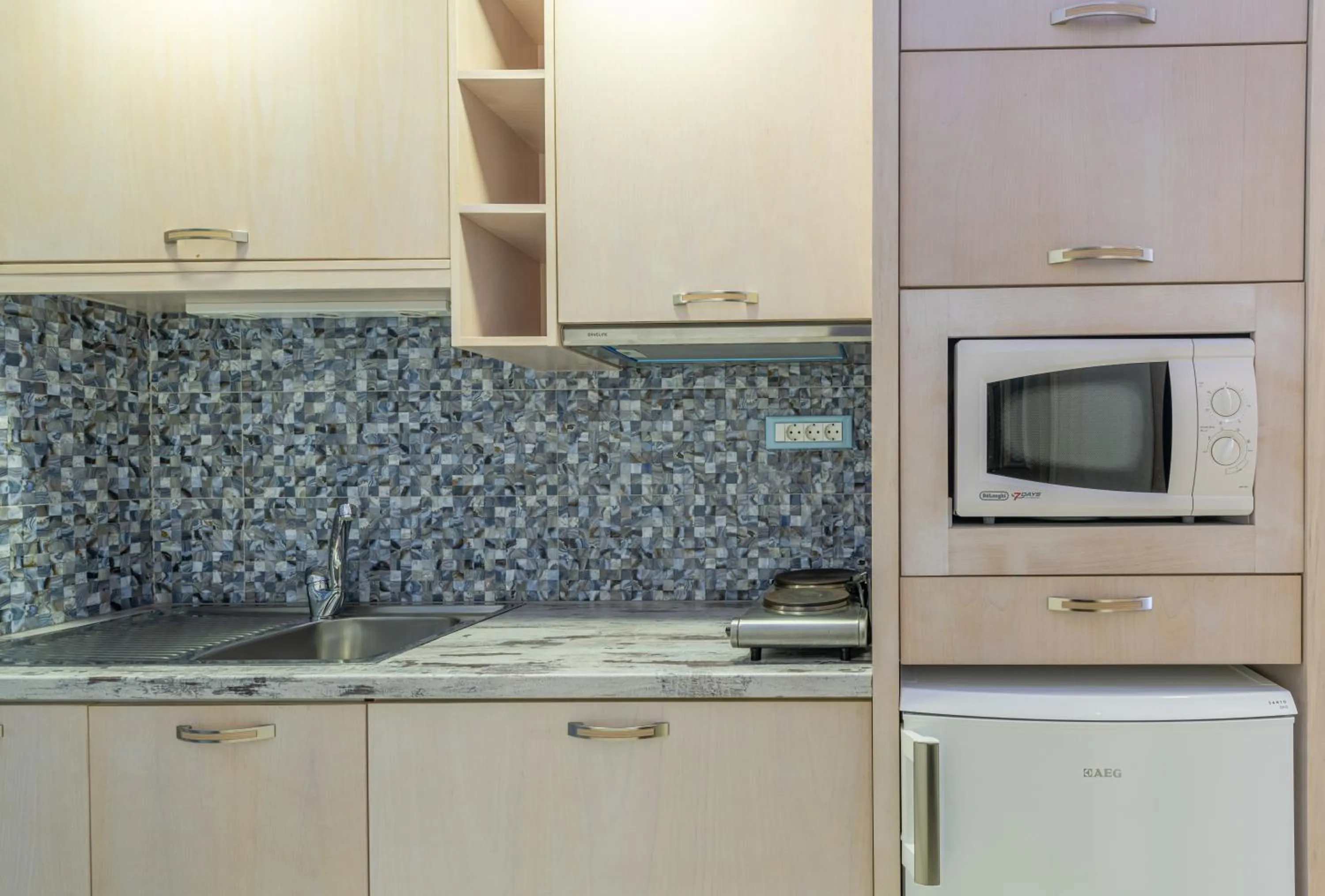 Kitchen or kitchenette in Sevach Apartments