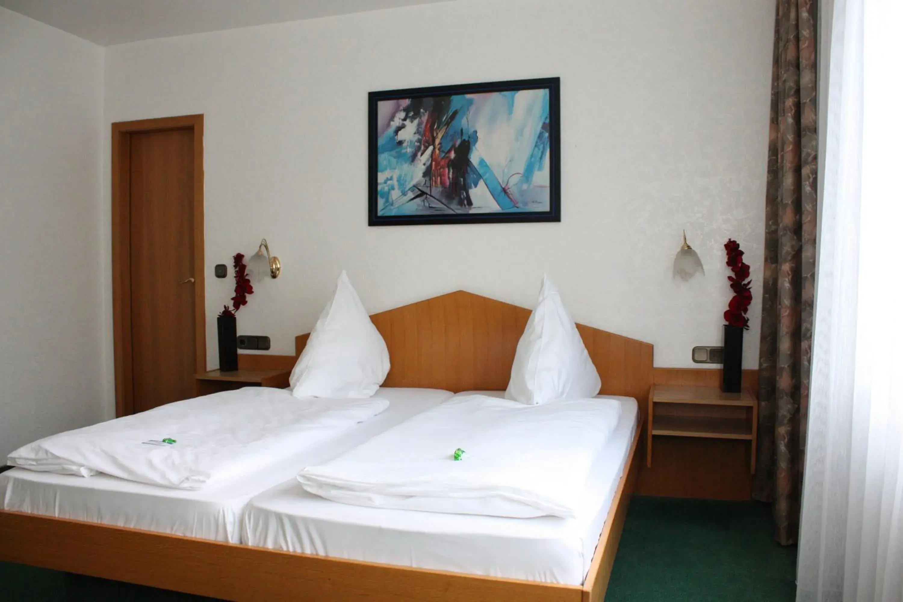 Bed in Mainbogen Hotel