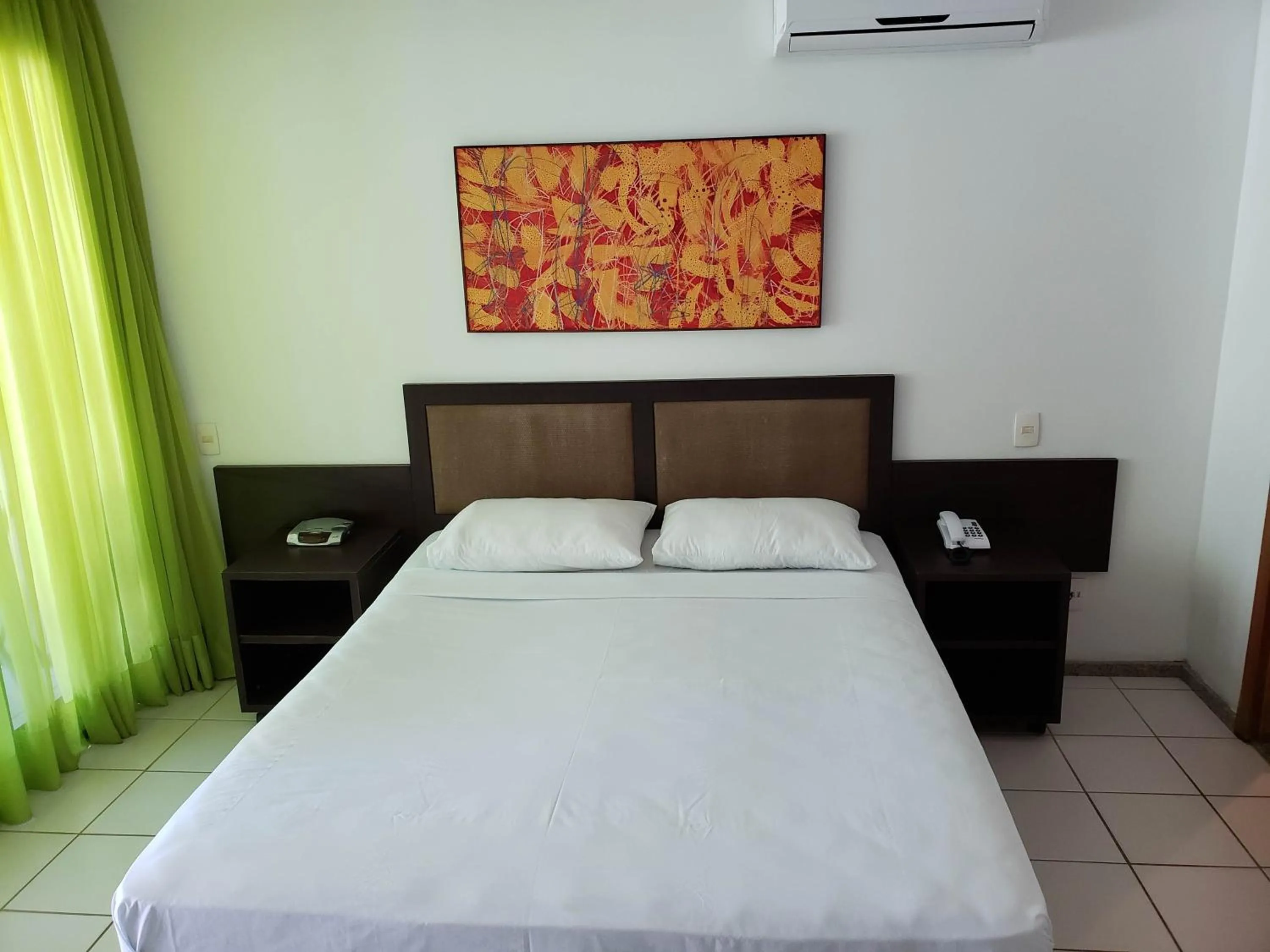 Bed in Marulhos Resort by Smart Stays