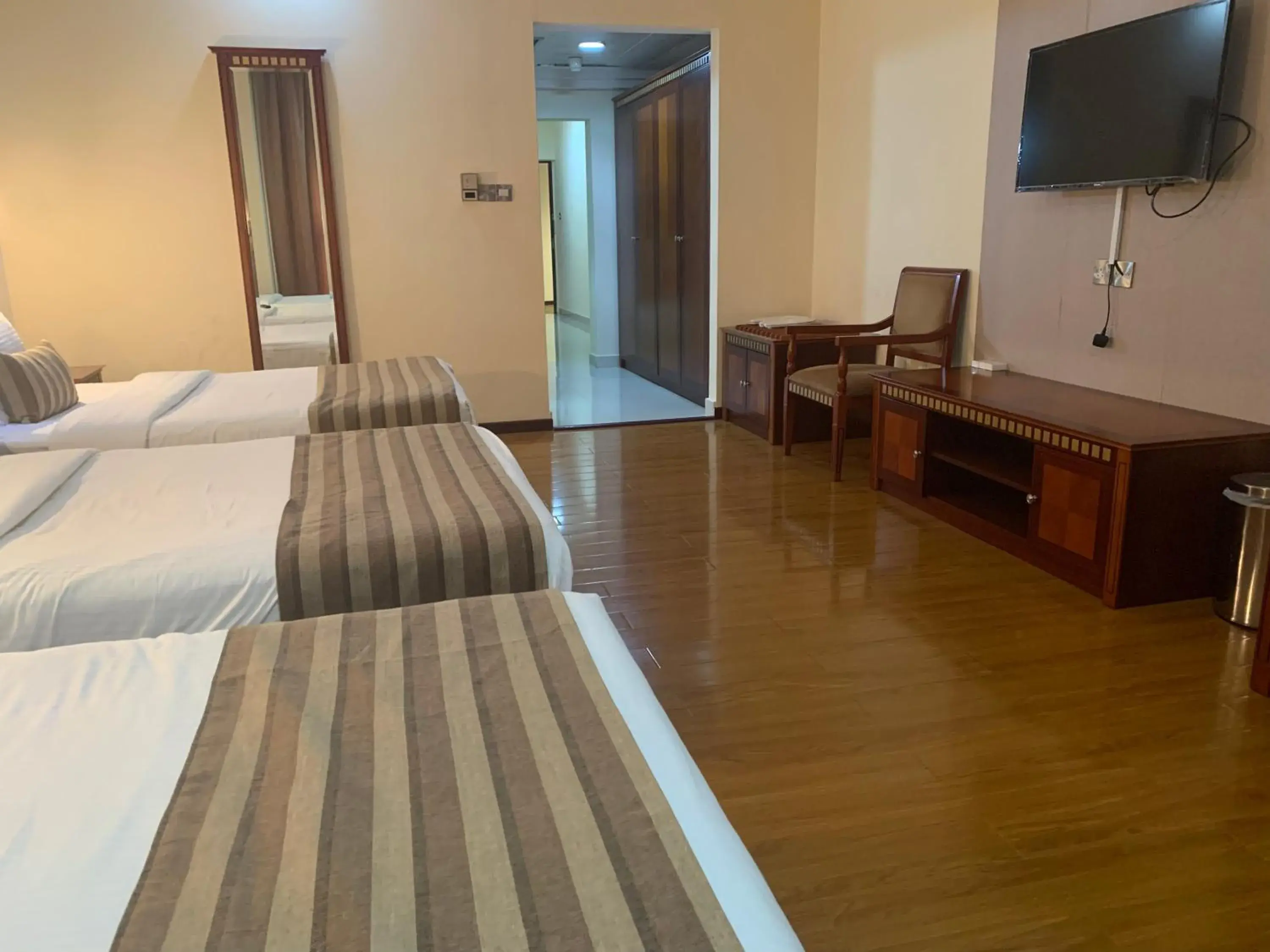 Bedroom, Bed in Hamdan Plaza Hotel Salalah, an HTG Hotel Bedroom, Bed in Hamdan Plaza Hotel Salalah, an HTG Hotel