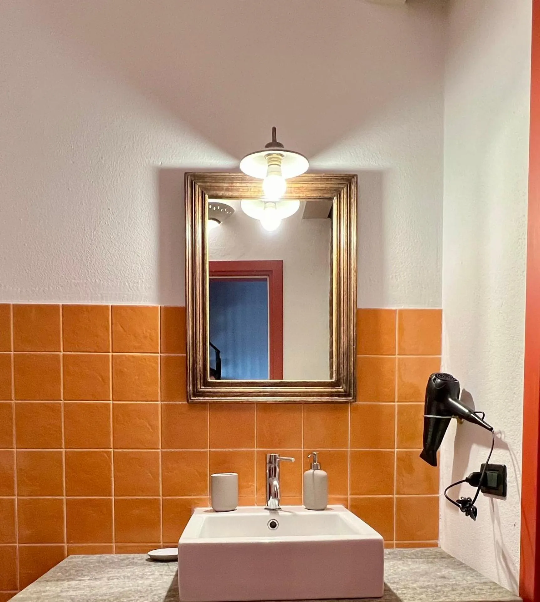 Bathroom in Le Serre Suites & Apartments