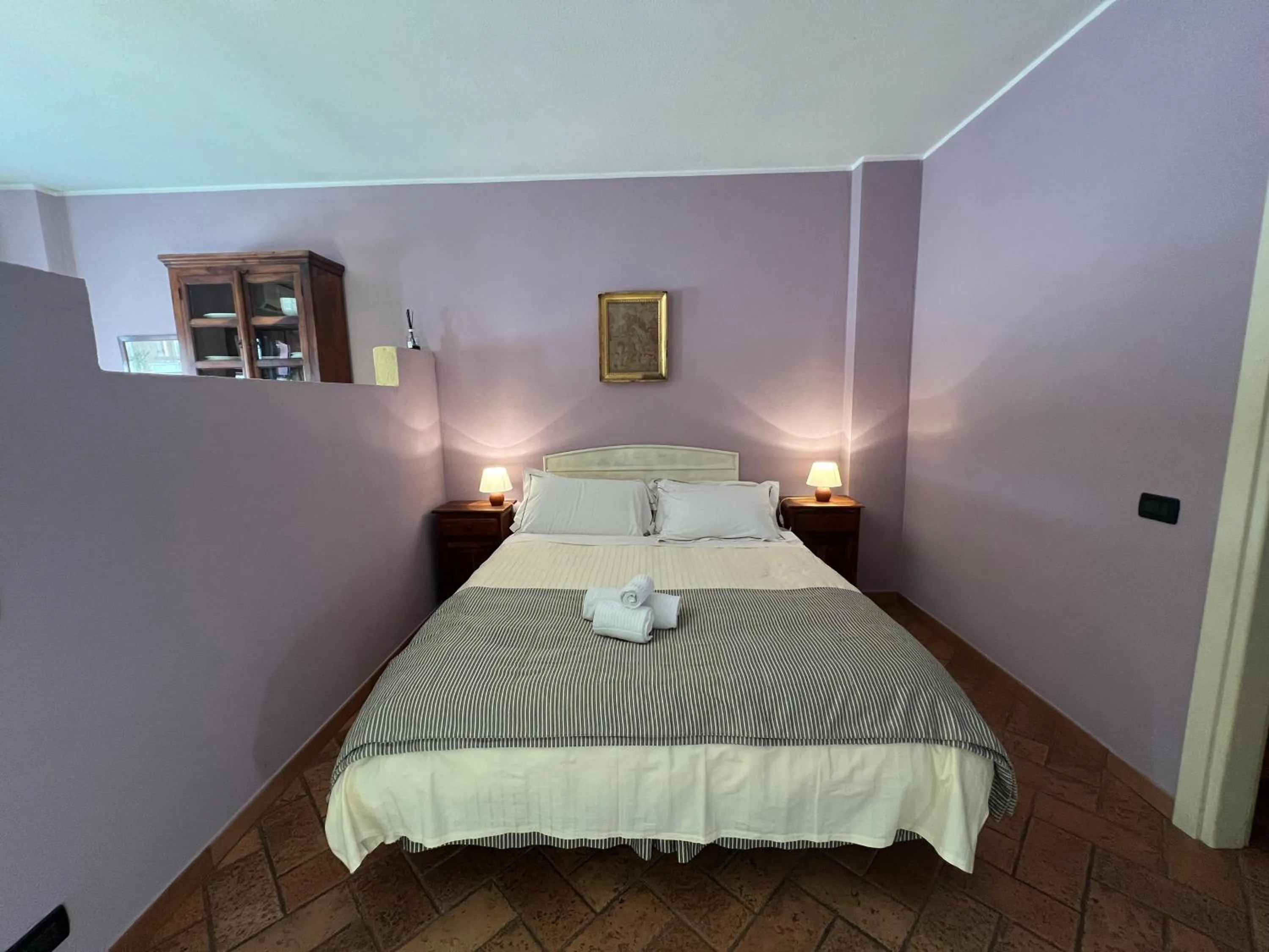 Bed in Le Serre Suites & Apartments