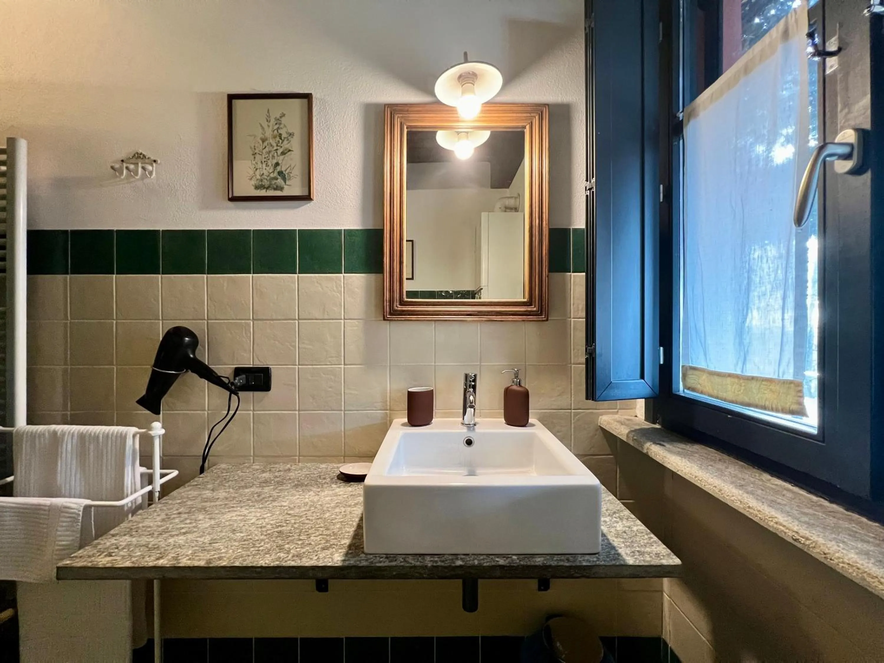 Bathroom in Le Serre Suites & Apartments