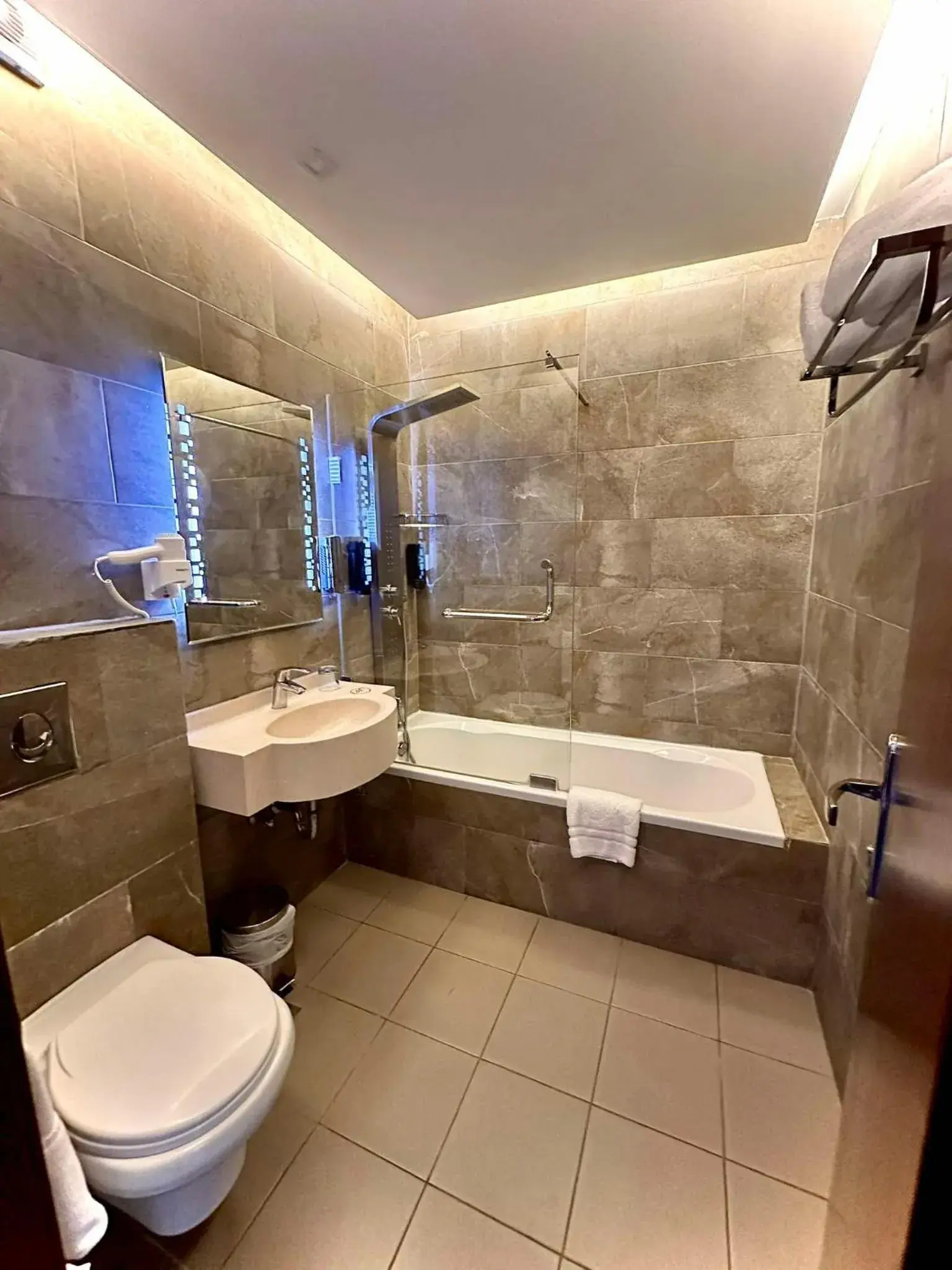 Bathroom in Midtown Hotel & Suites Bathroom in Midtown Hotel & Suites