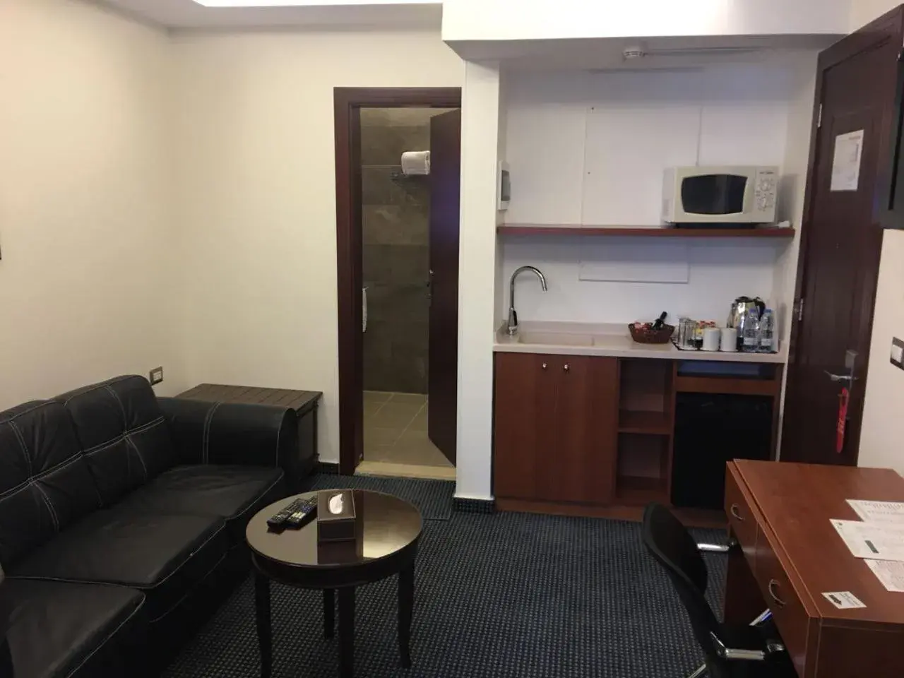 Living room in Midtown Hotel & Suites Living room in Midtown Hotel & Suites