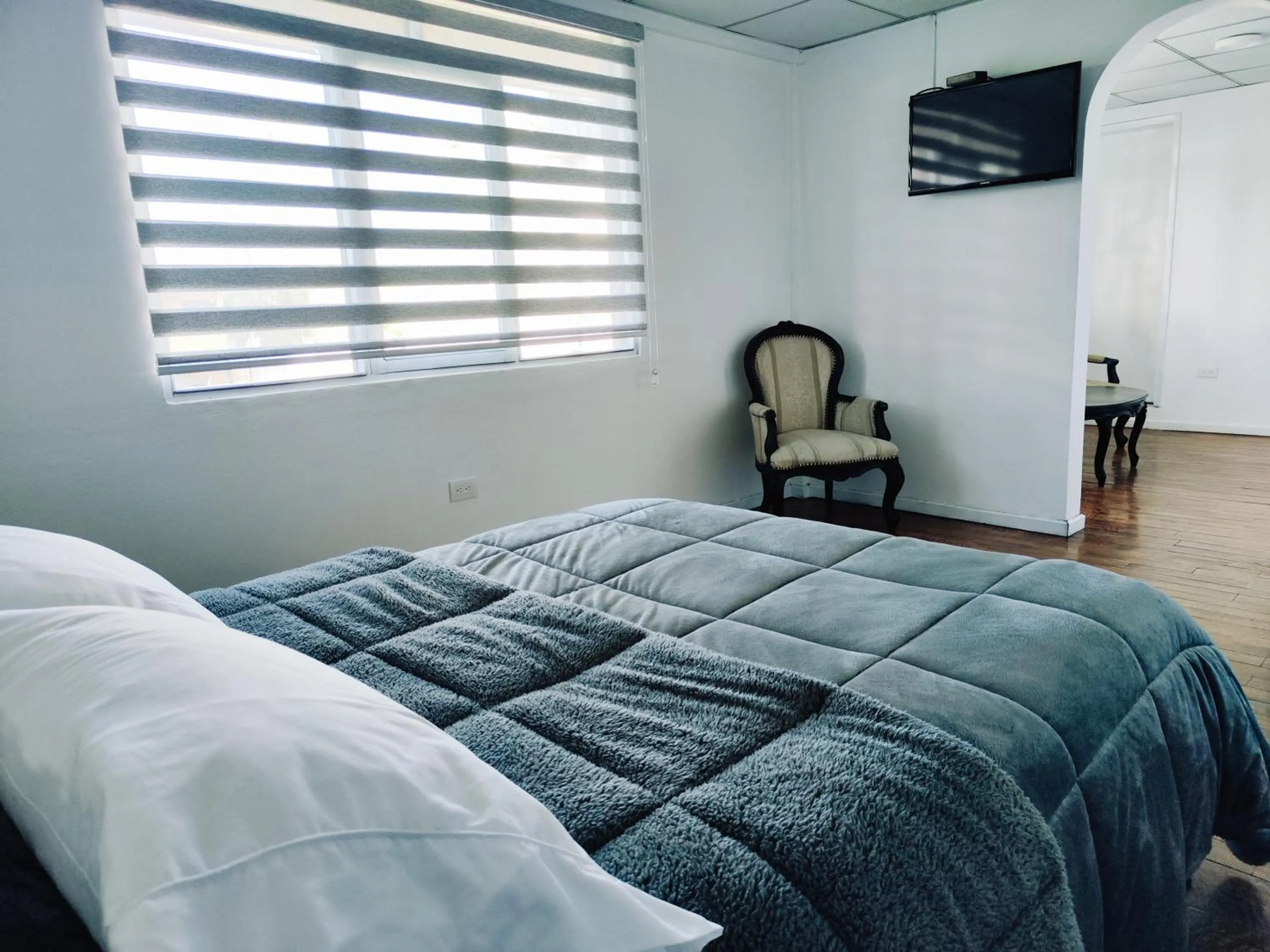 Bed in Hotel Muros Quito