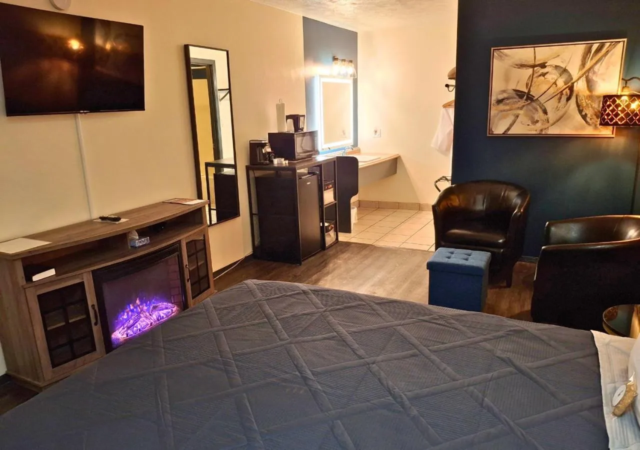 Bed in Shady Acre Inn and Suites