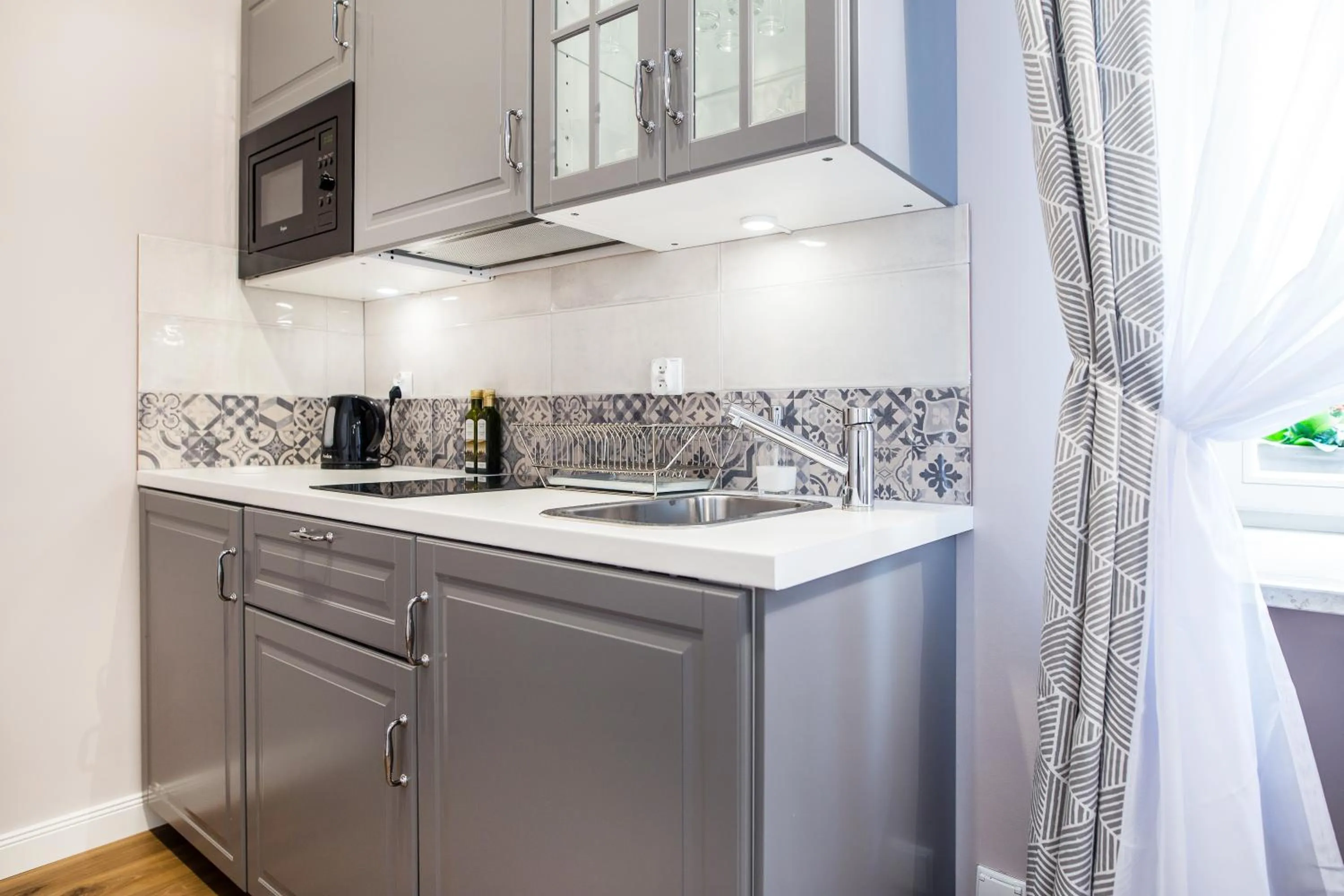 Kitchen or kitchenette in Krakow Central Apartments