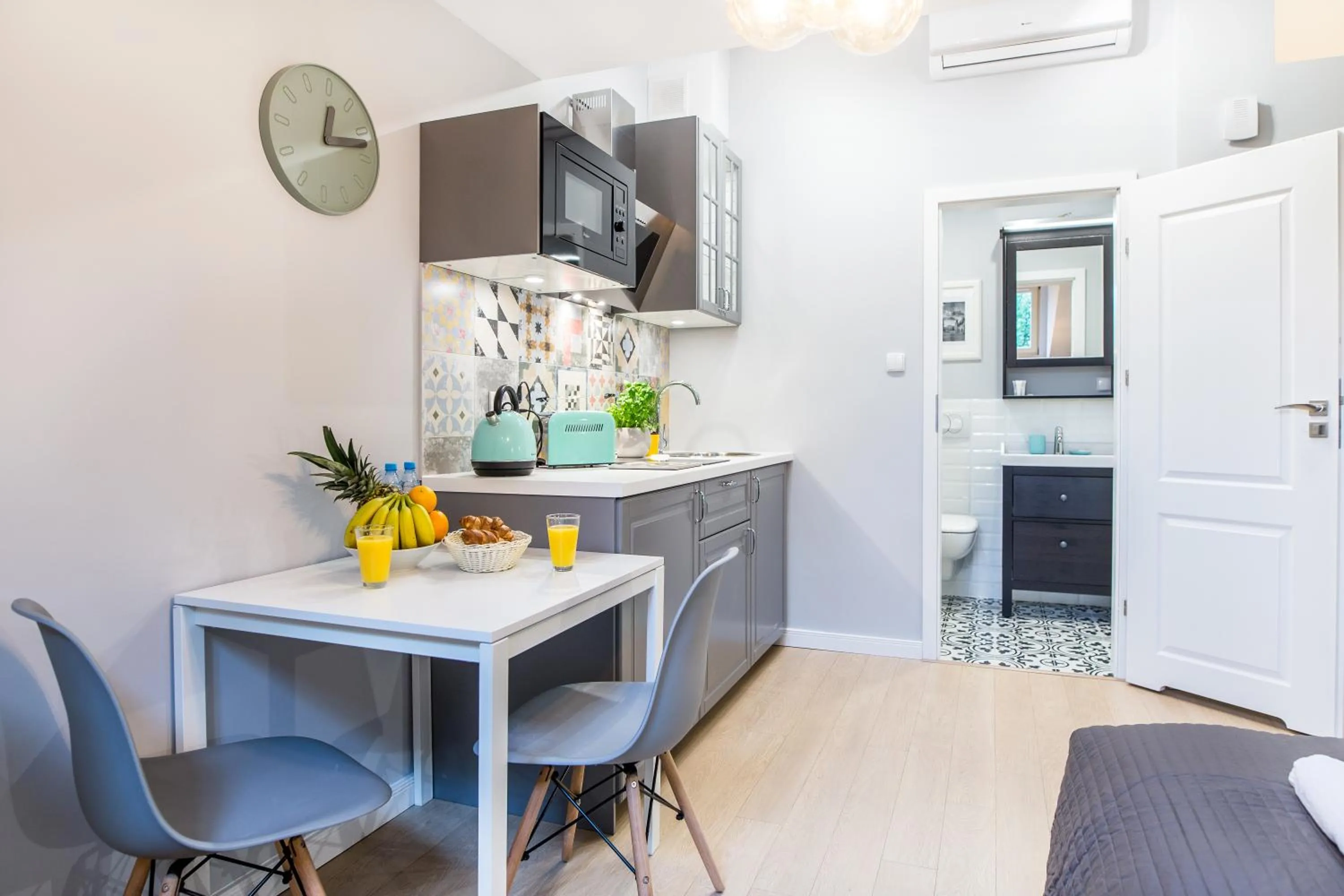 Kitchen or kitchenette in Krakow Central Apartments