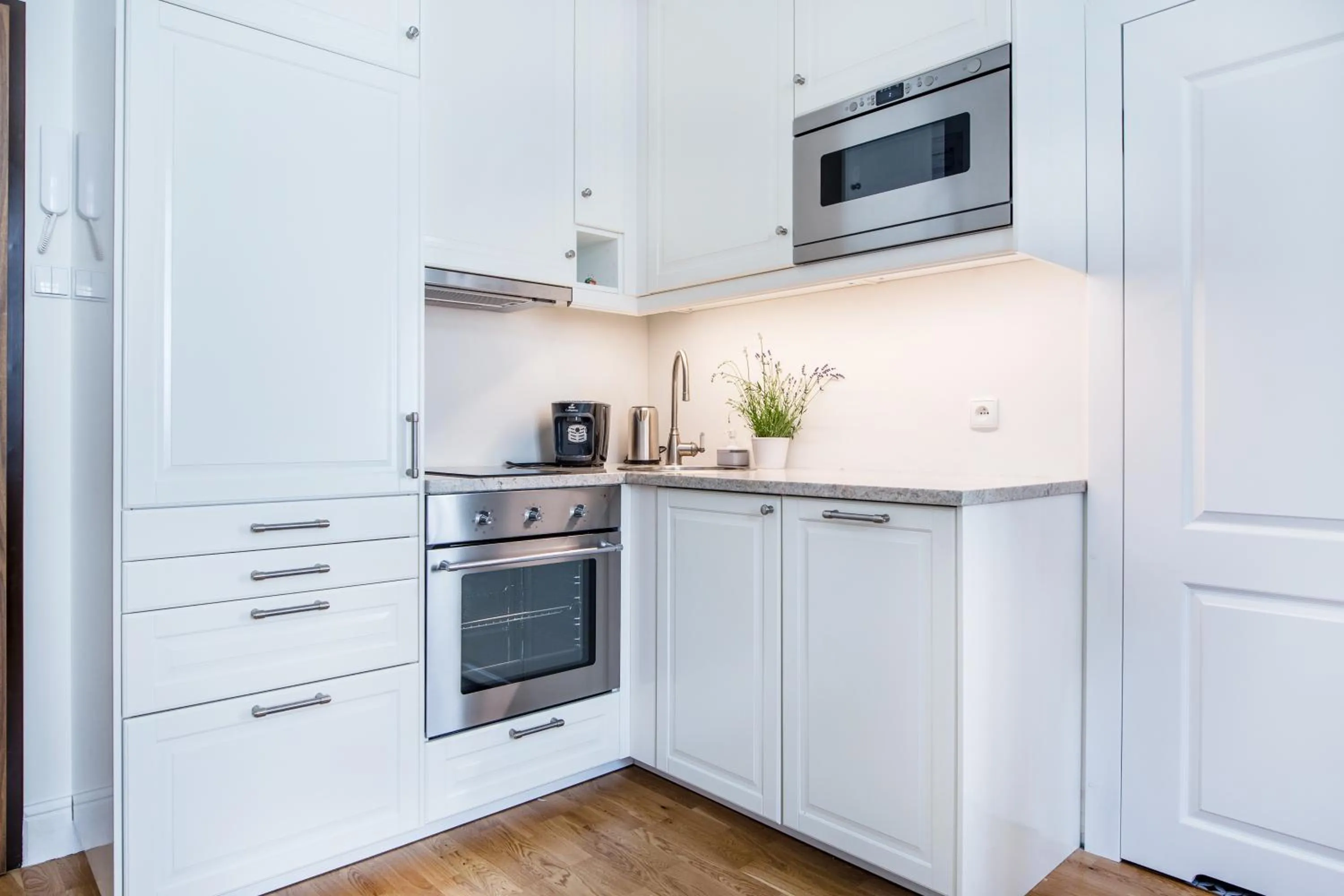 Kitchen or kitchenette in Krakow Central Apartments