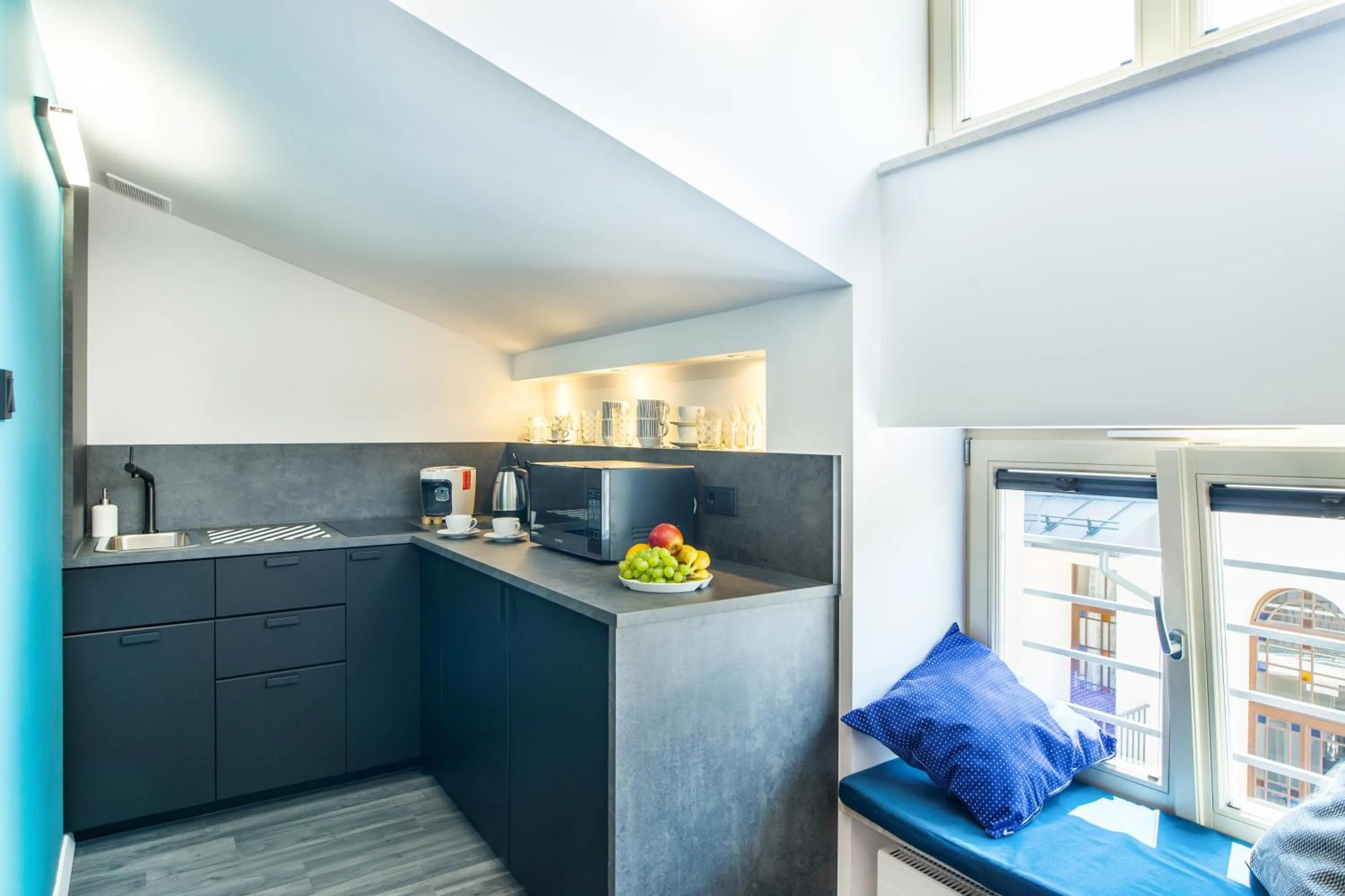 Kitchen or kitchenette in Krakow Central Apartments