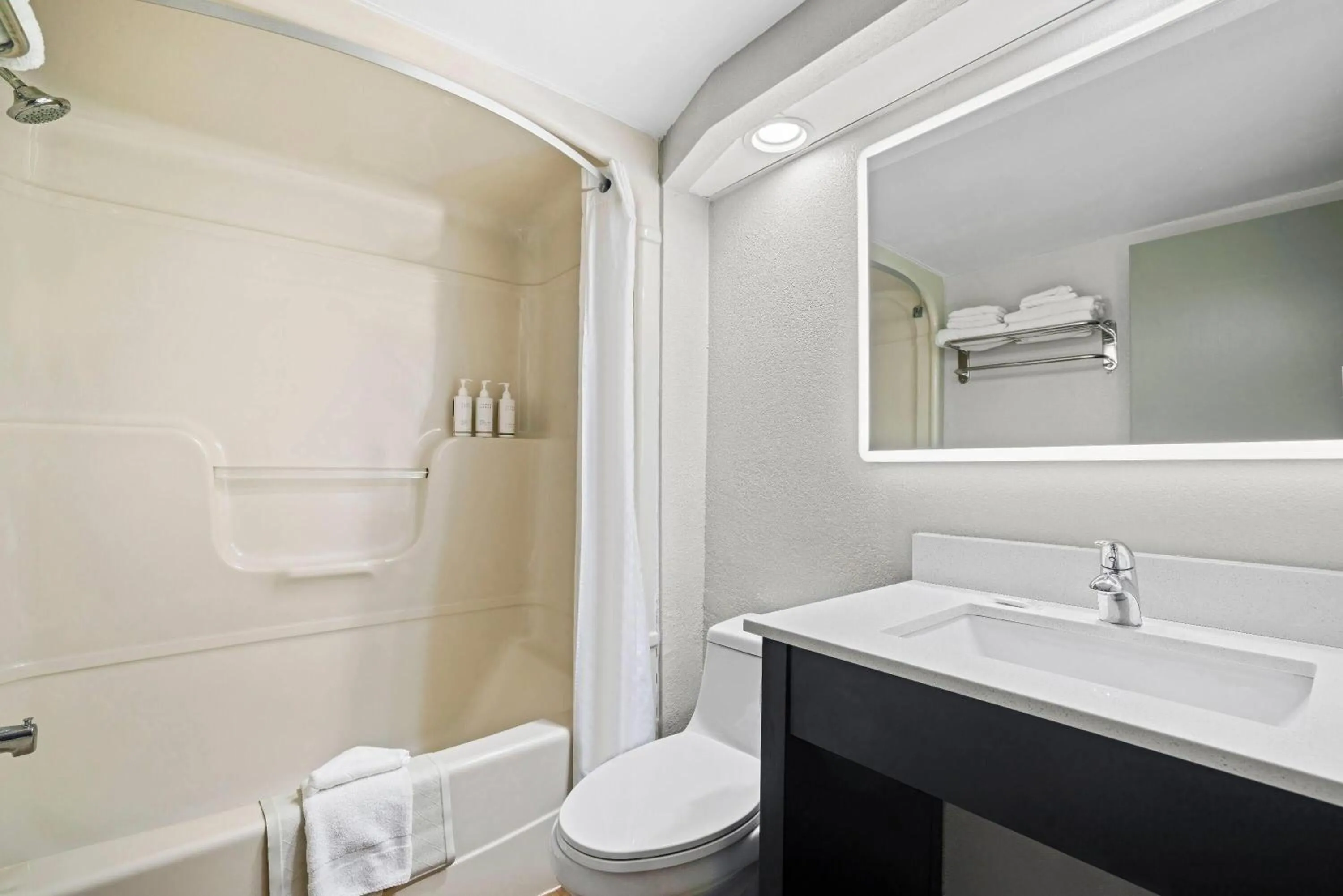 Bathroom in Days Inn by Wyndham Utica