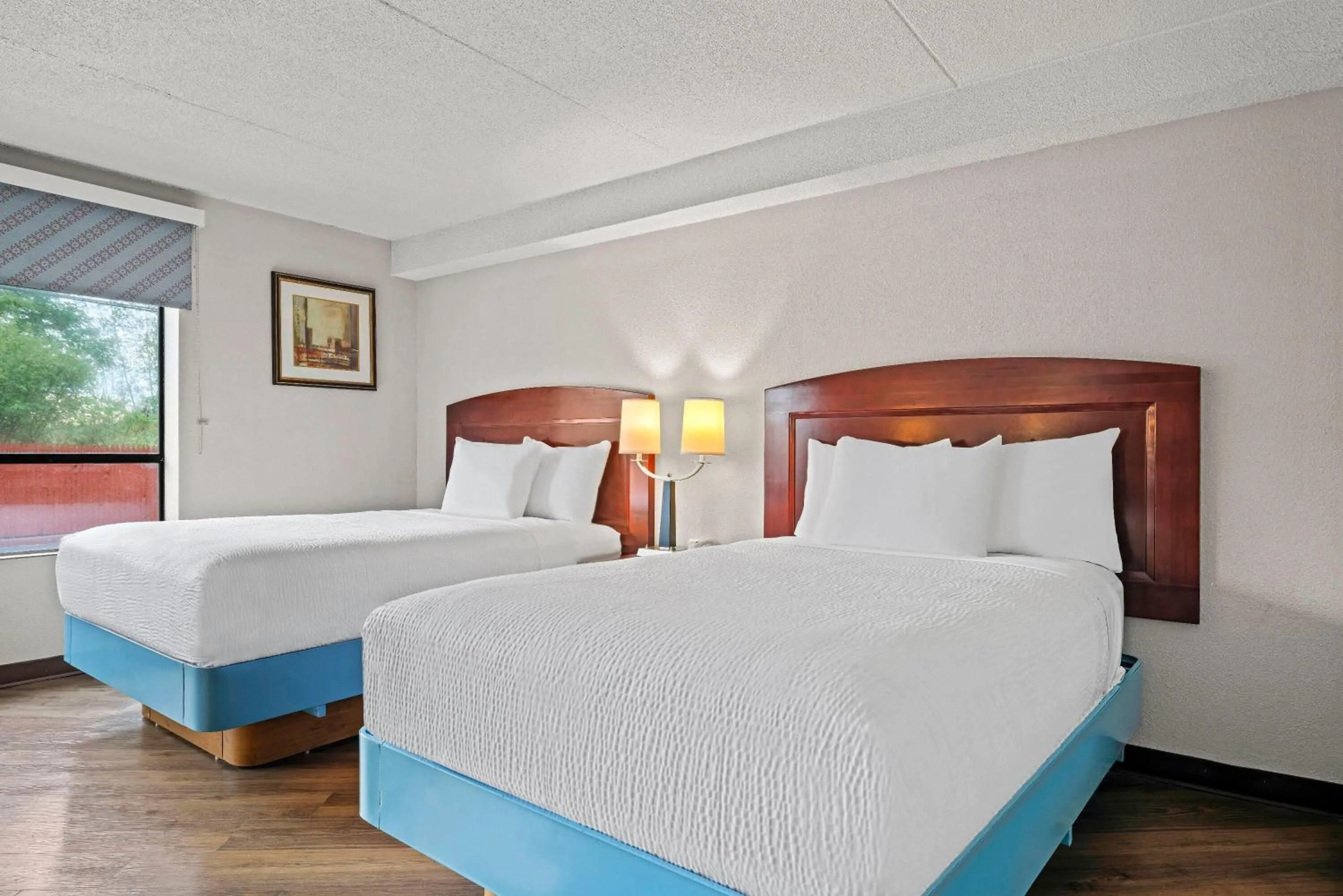 Bed in Days Inn by Wyndham Utica