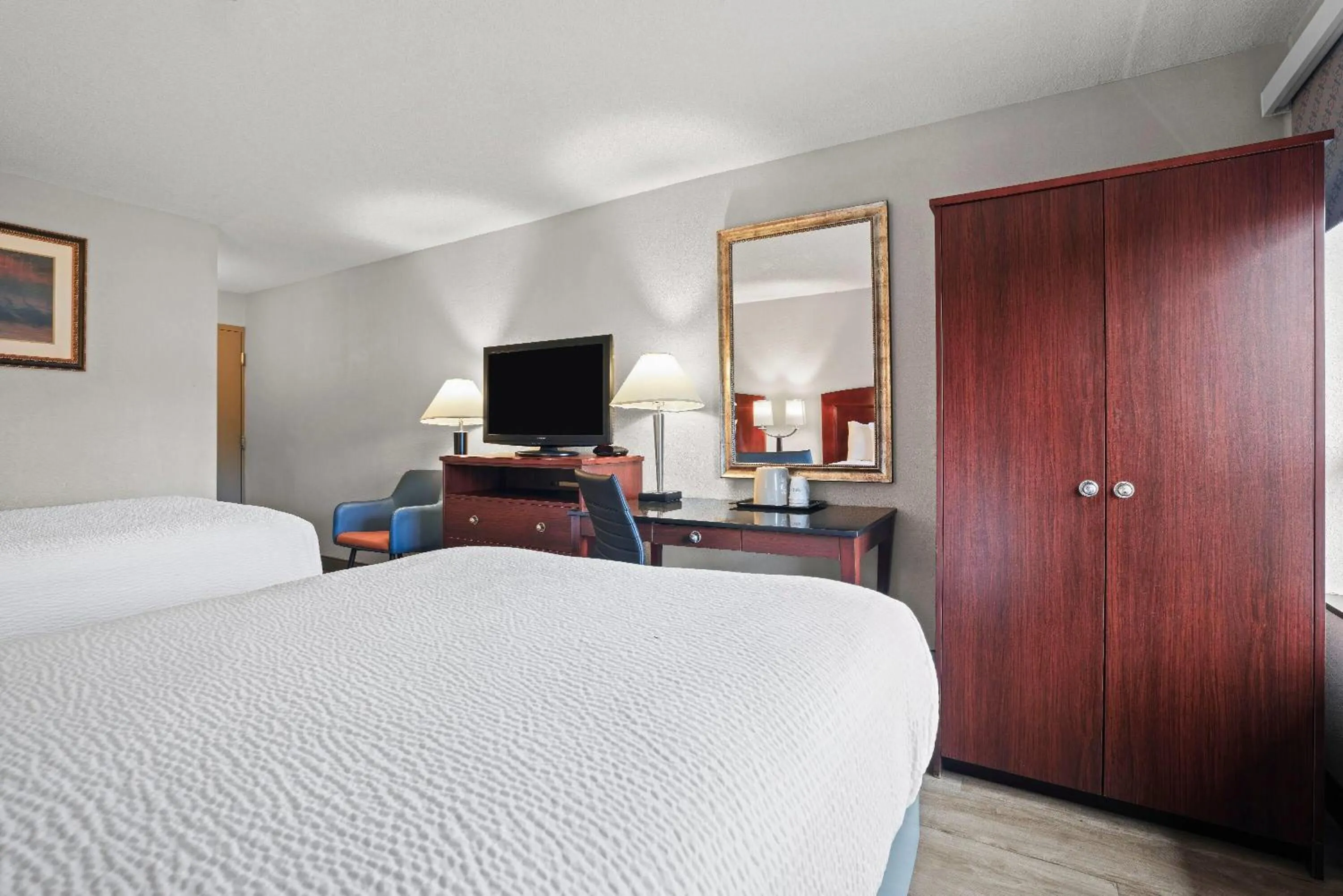 Bed in Days Inn by Wyndham Utica