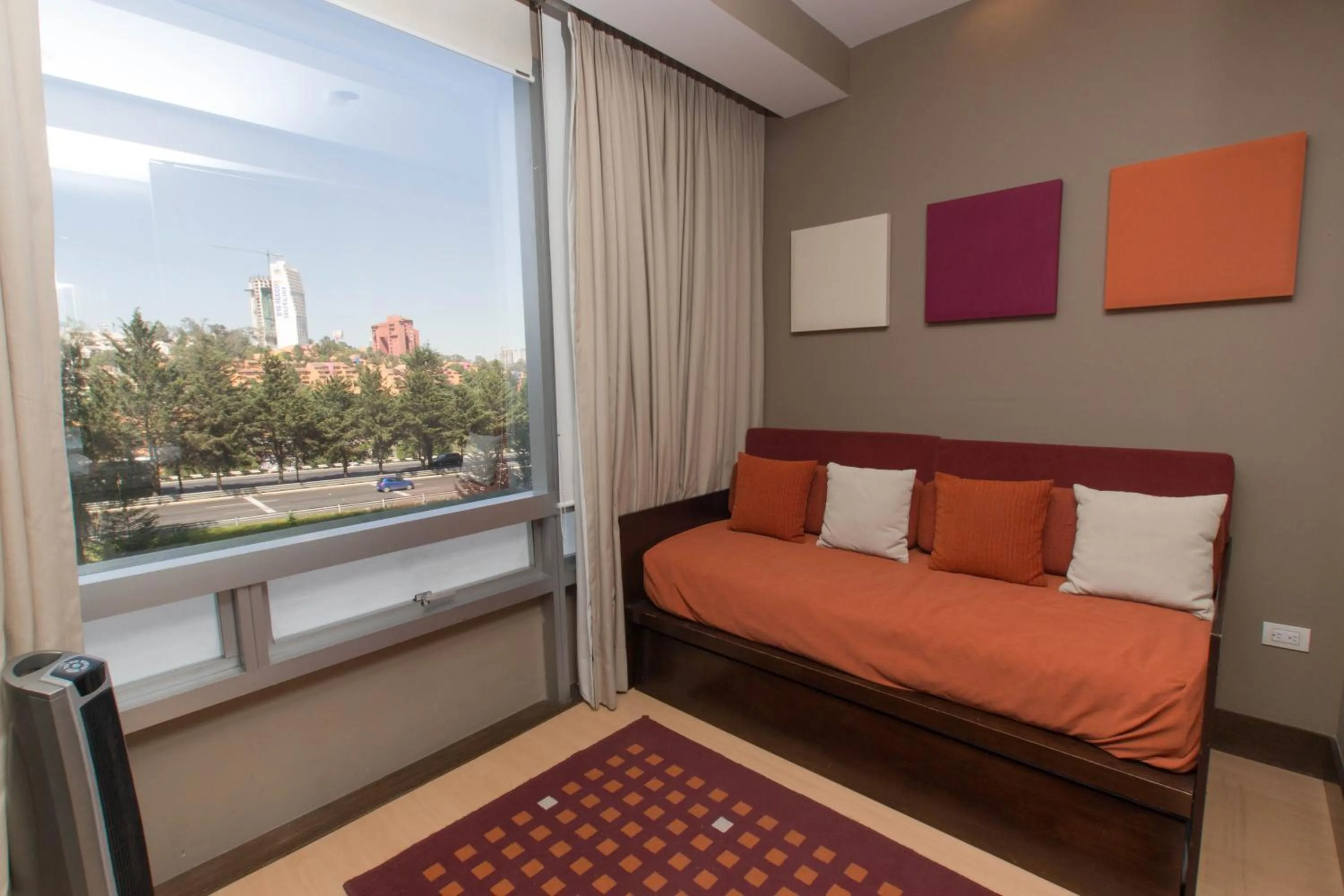 Living room, Bed in Hausuites