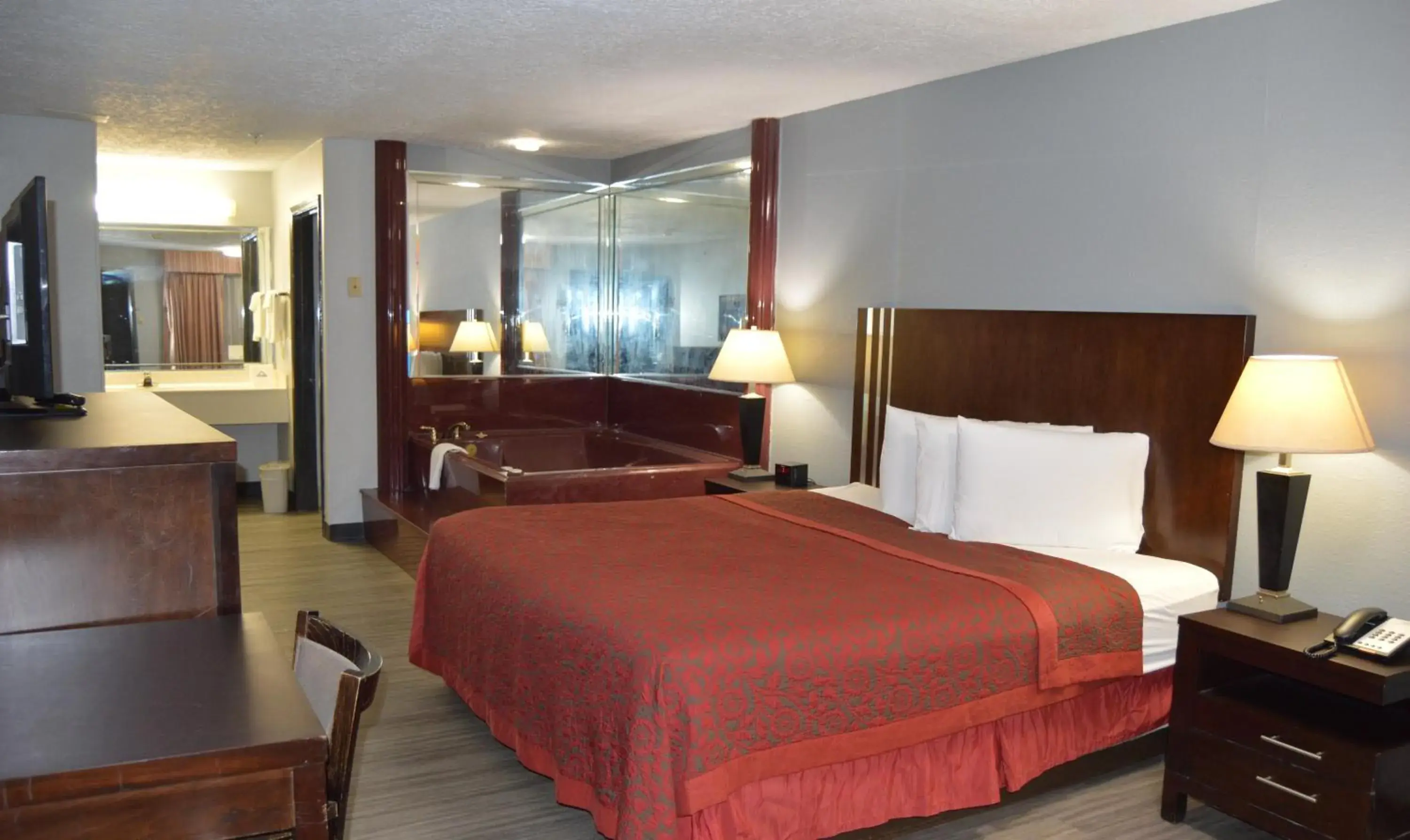 Bedroom, Bed in Days Inn & Suites by Wyndham Winnie Bedroom, Bed in Days Inn & Suites by Wyndham Winnie