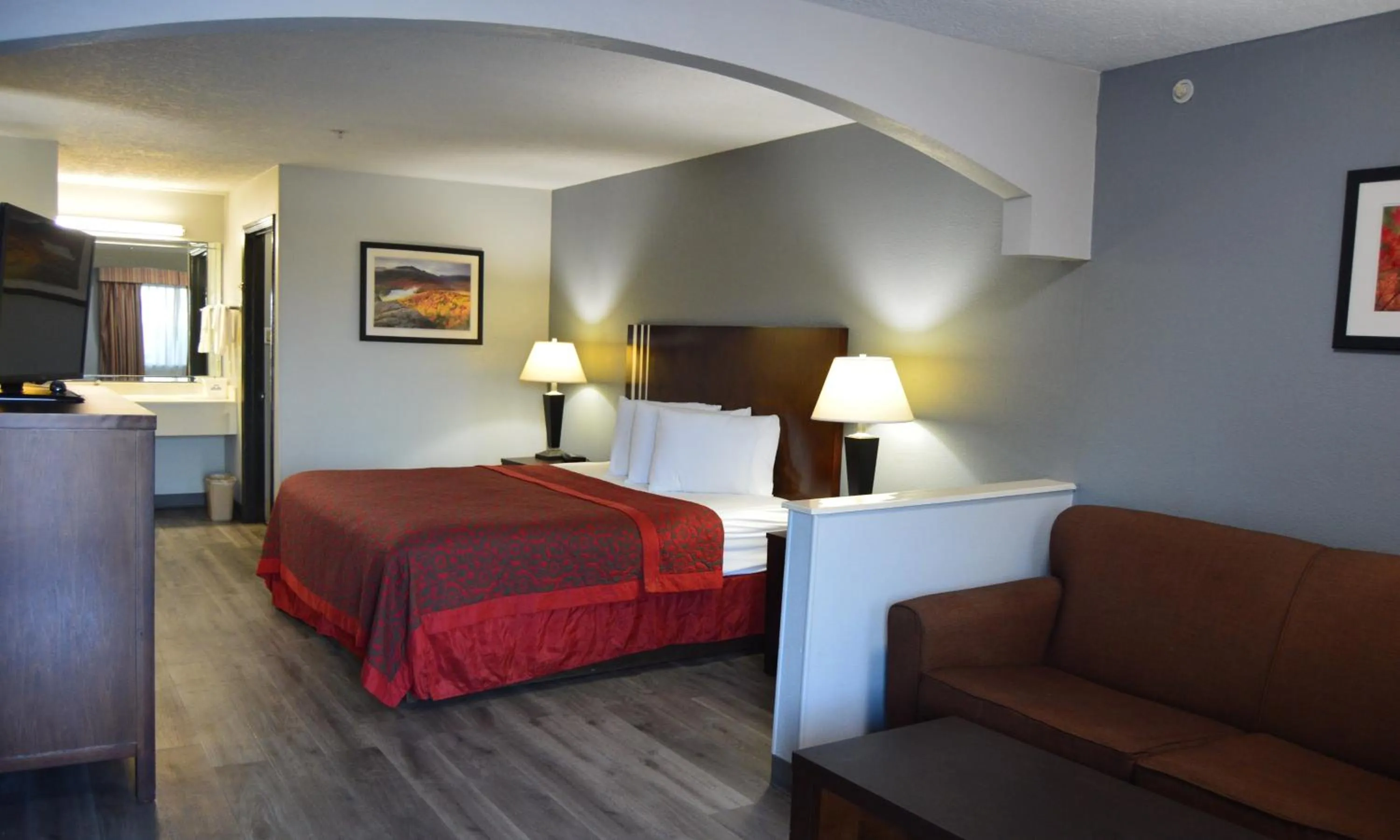 Bedroom, Bed in Days Inn & Suites by Wyndham Winnie