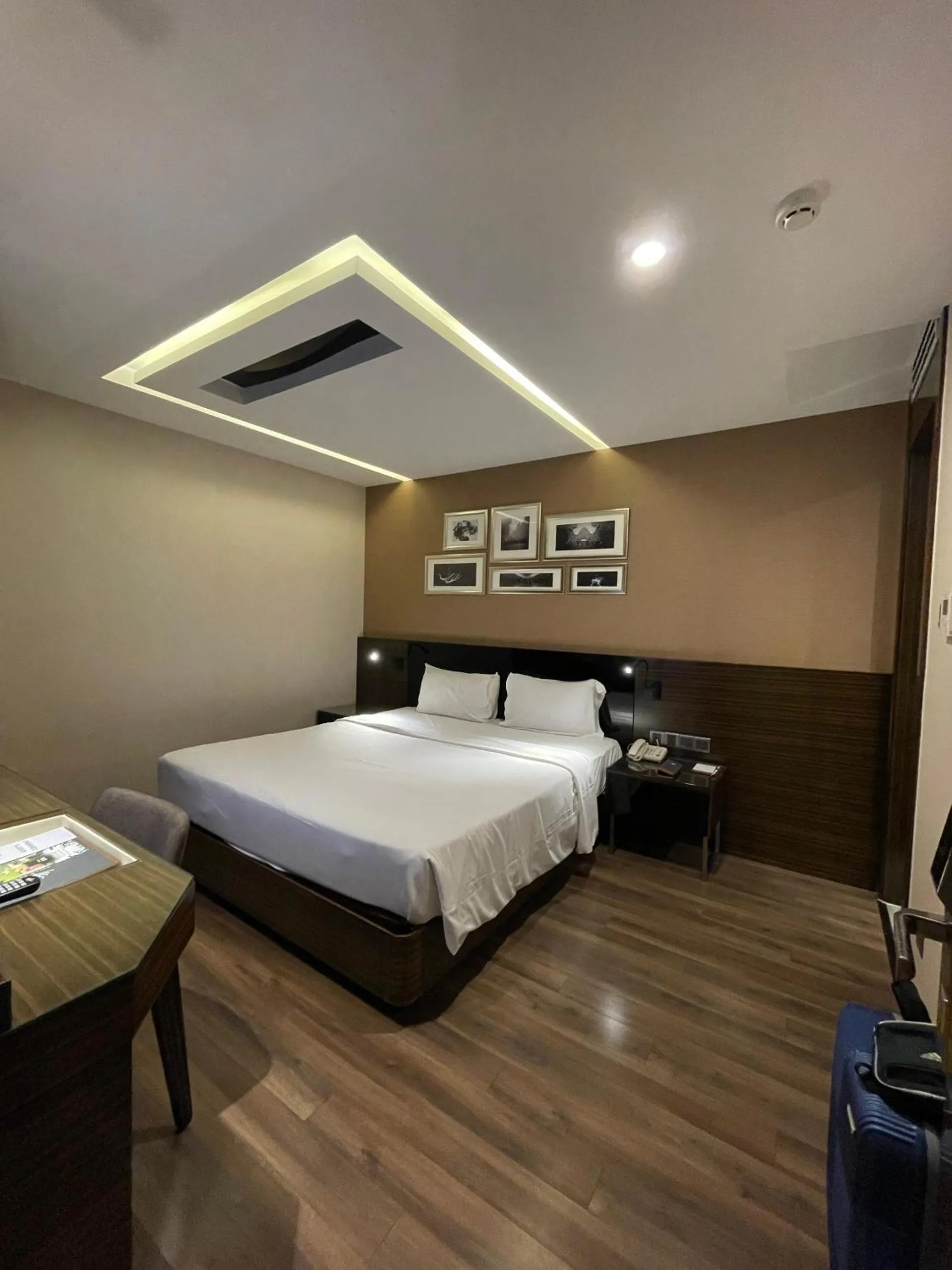 Bed in Queen Ann Hotel