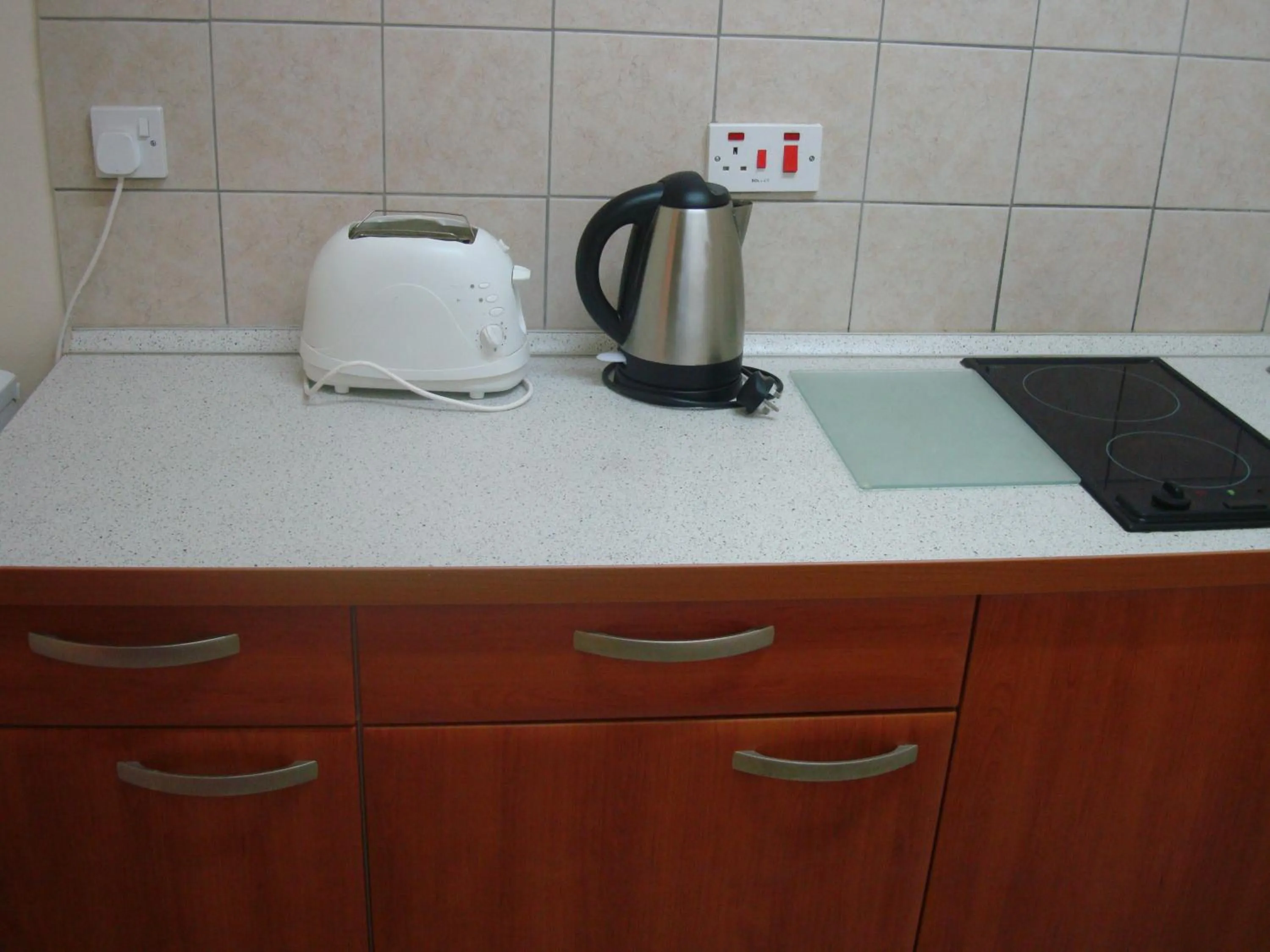 Kitchen or kitchenette in Lordos Hotel Apts Limassol