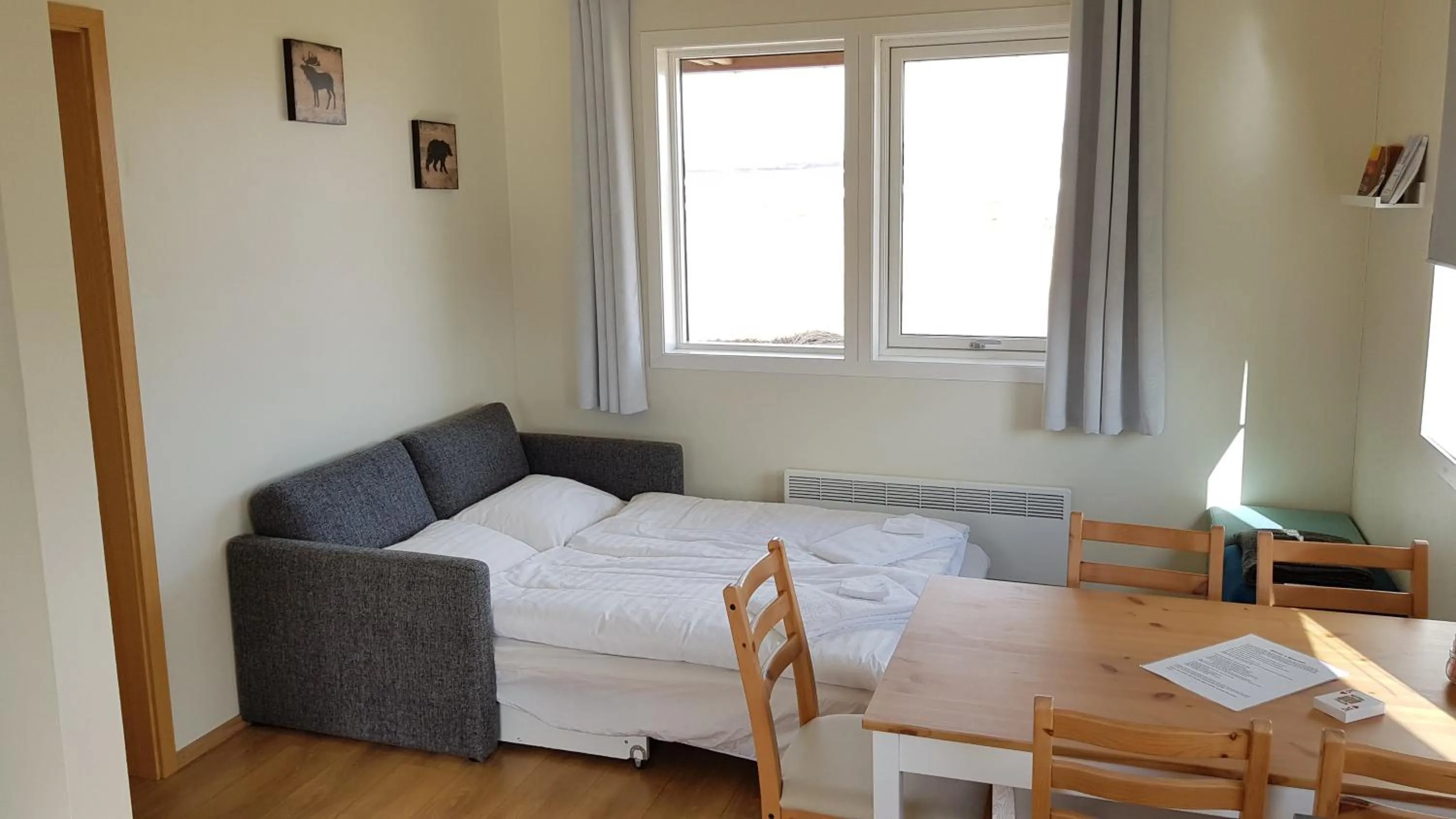 Living room, Bed in Hjartarstaðir Guesthouse