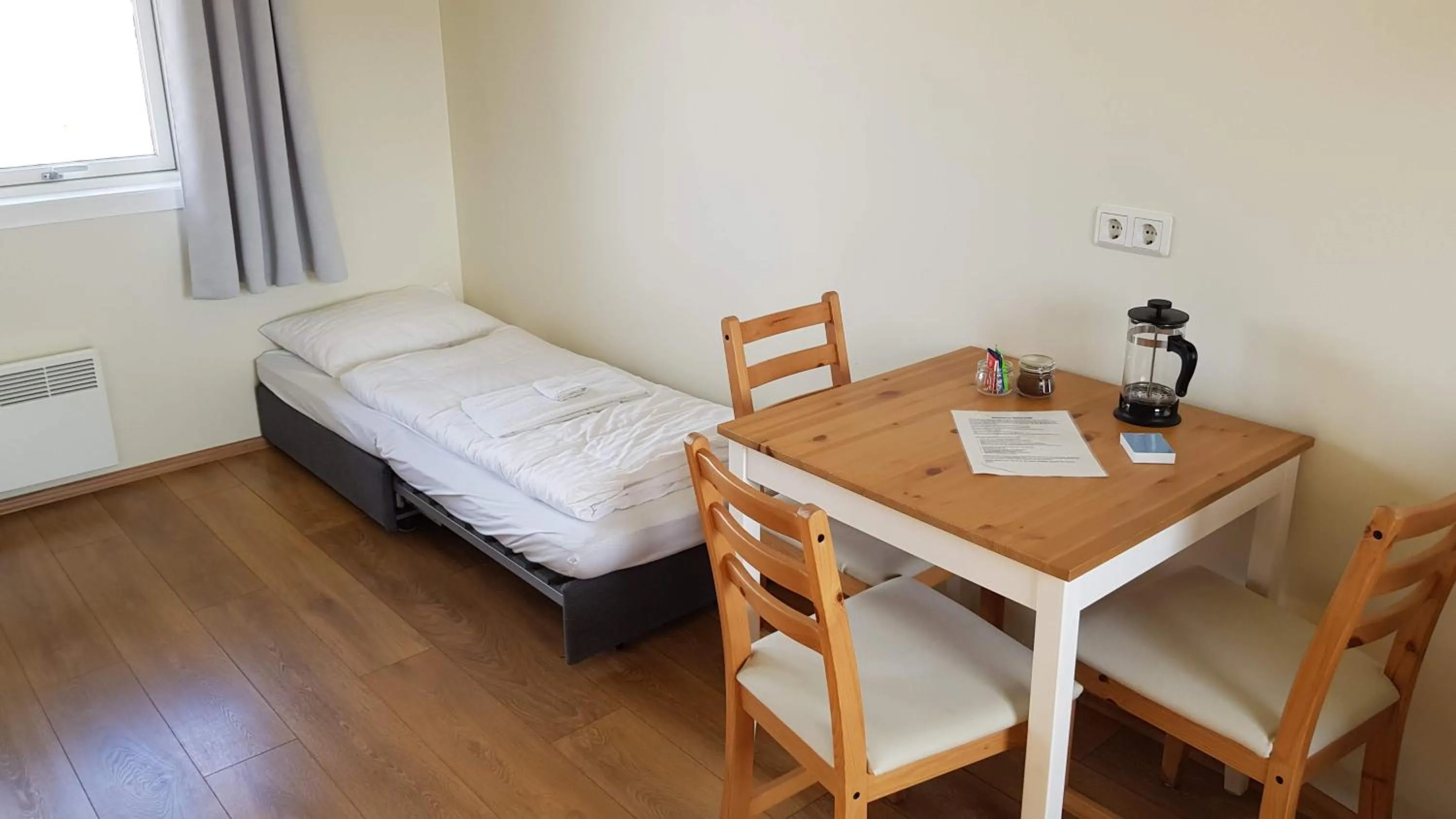 Bed in Hjartarstaðir Guesthouse