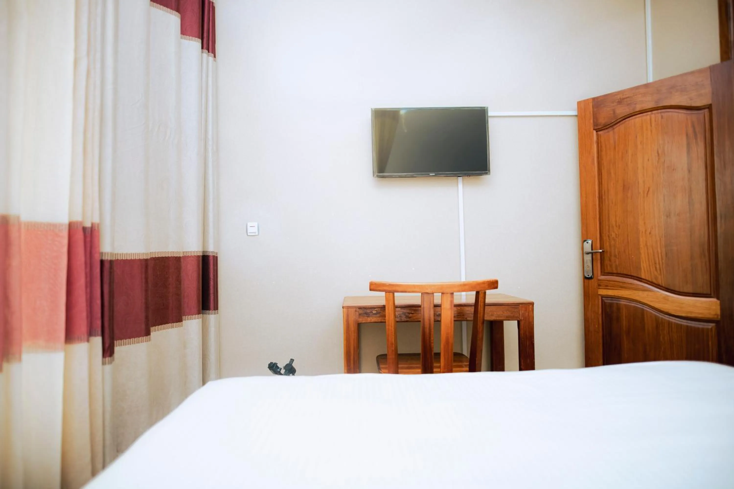 Bedroom in Hotel Peace Guest House