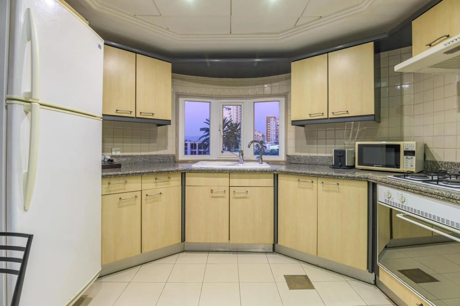 Kitchen or kitchenette in Lahoya Suites