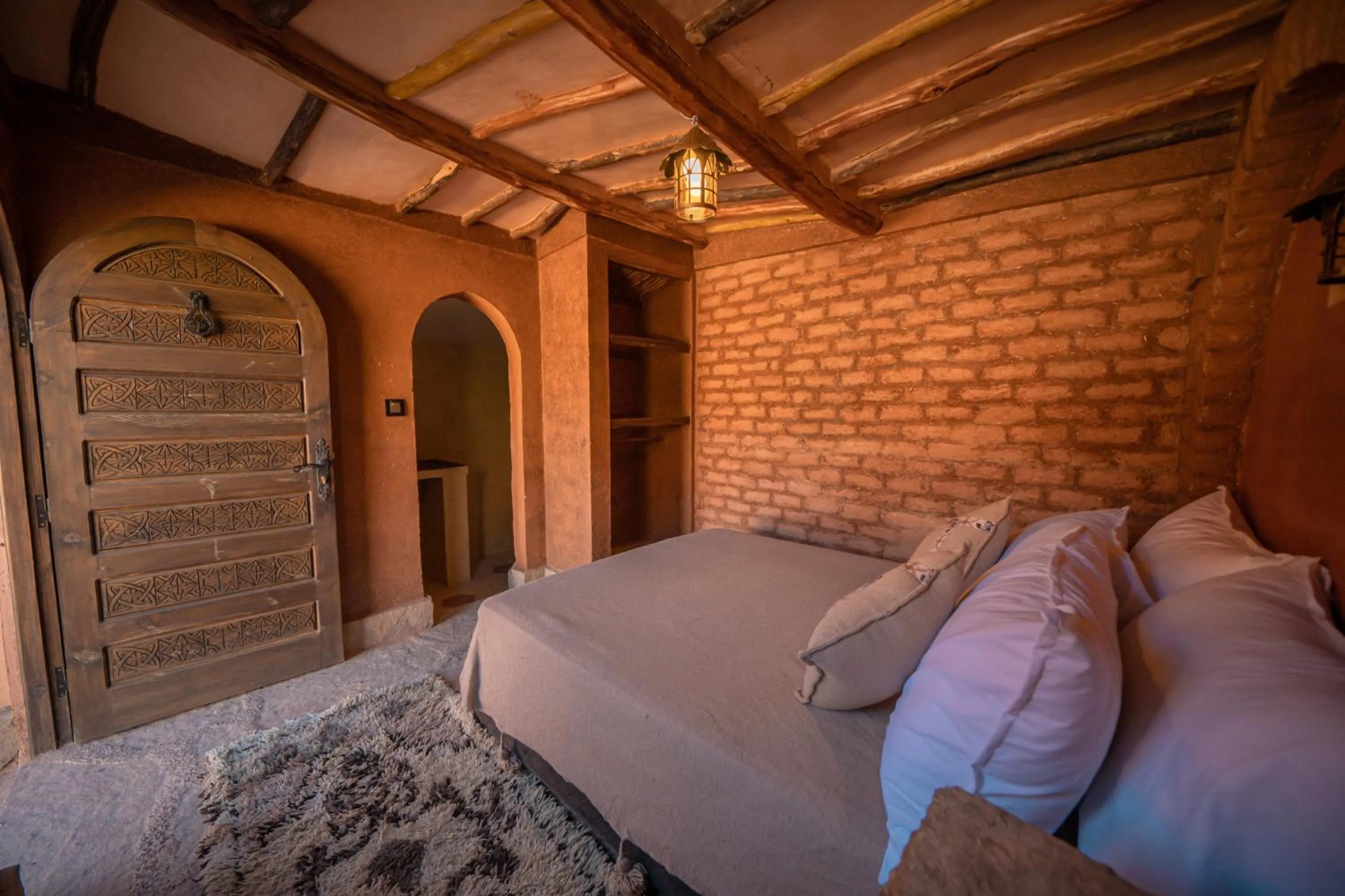 Bed in Ouednoujoum Ecolodge & Spa