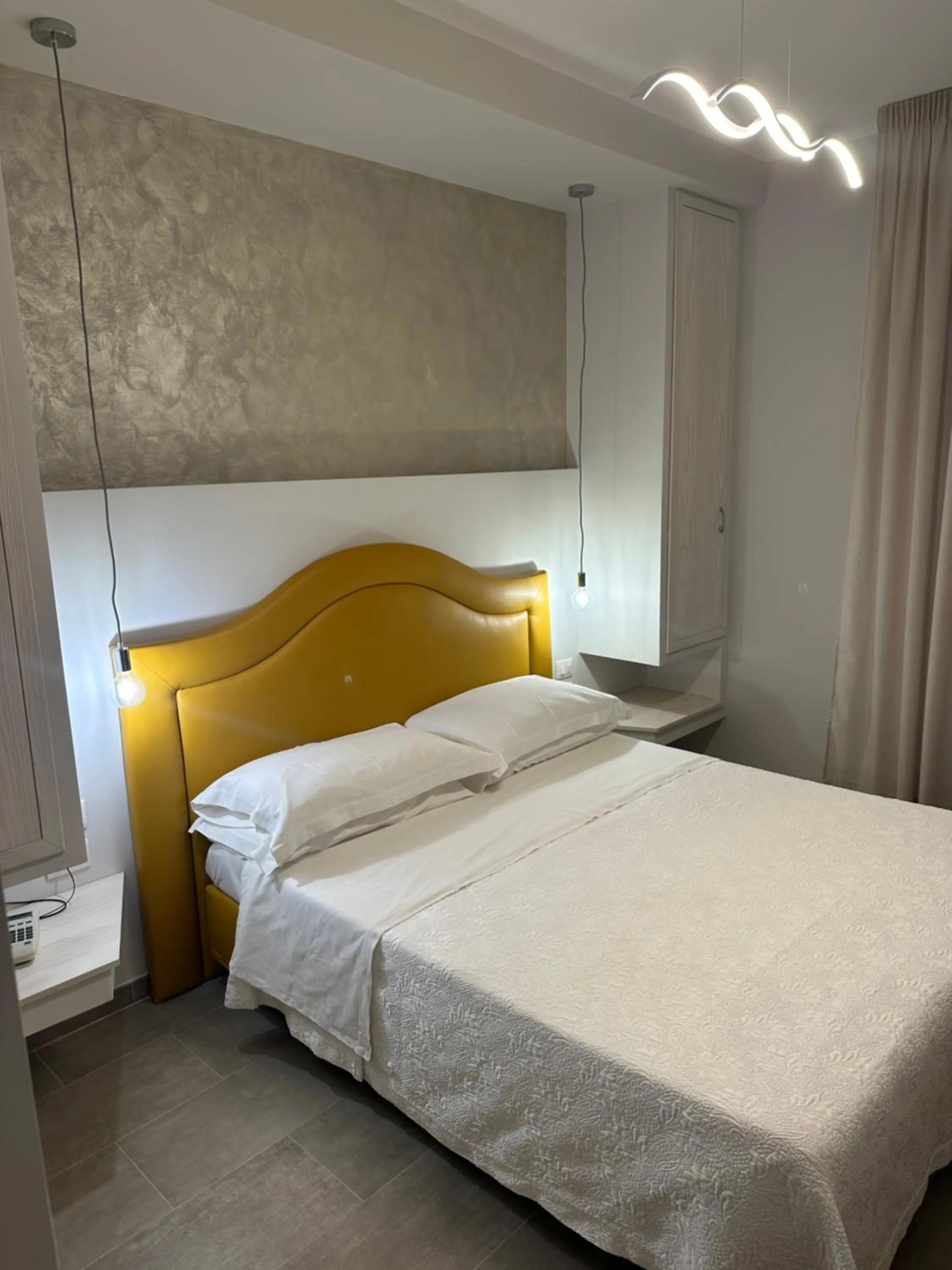 Bed in Hotel Mediterraneo