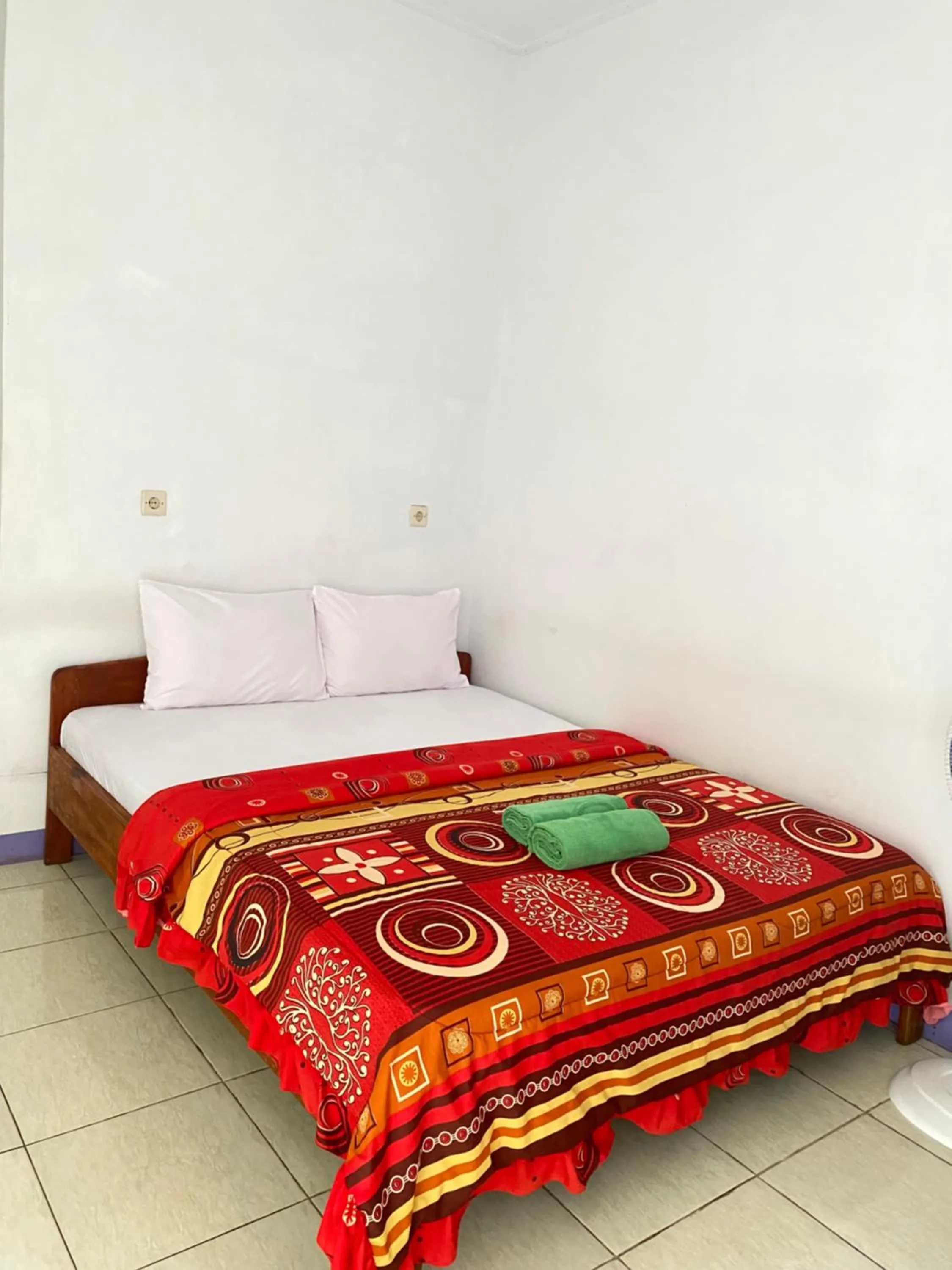 Bed in Mahoni Guest House