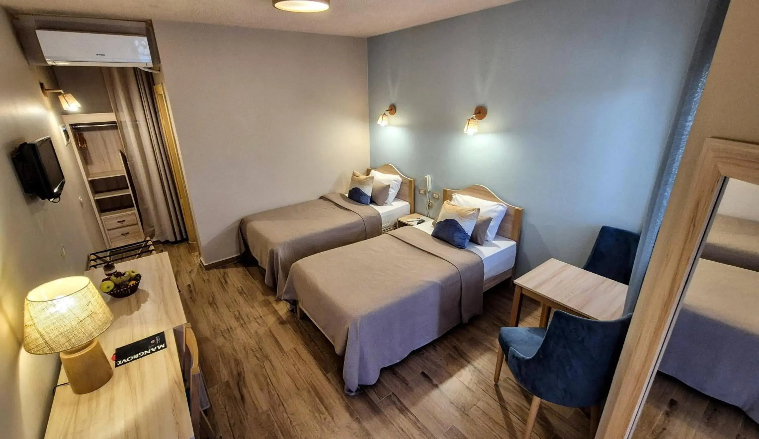 Bed in Mangrove Bay Resort Bed in Mangrove Bay Resort