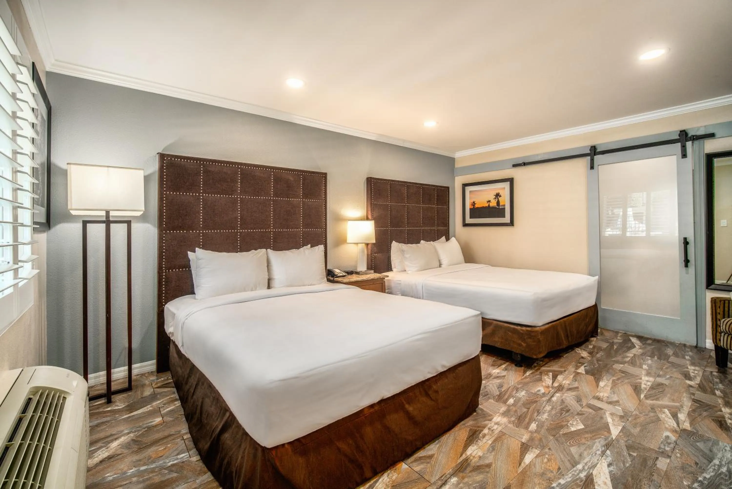 Bed in The Buena Park Hotel & Suites