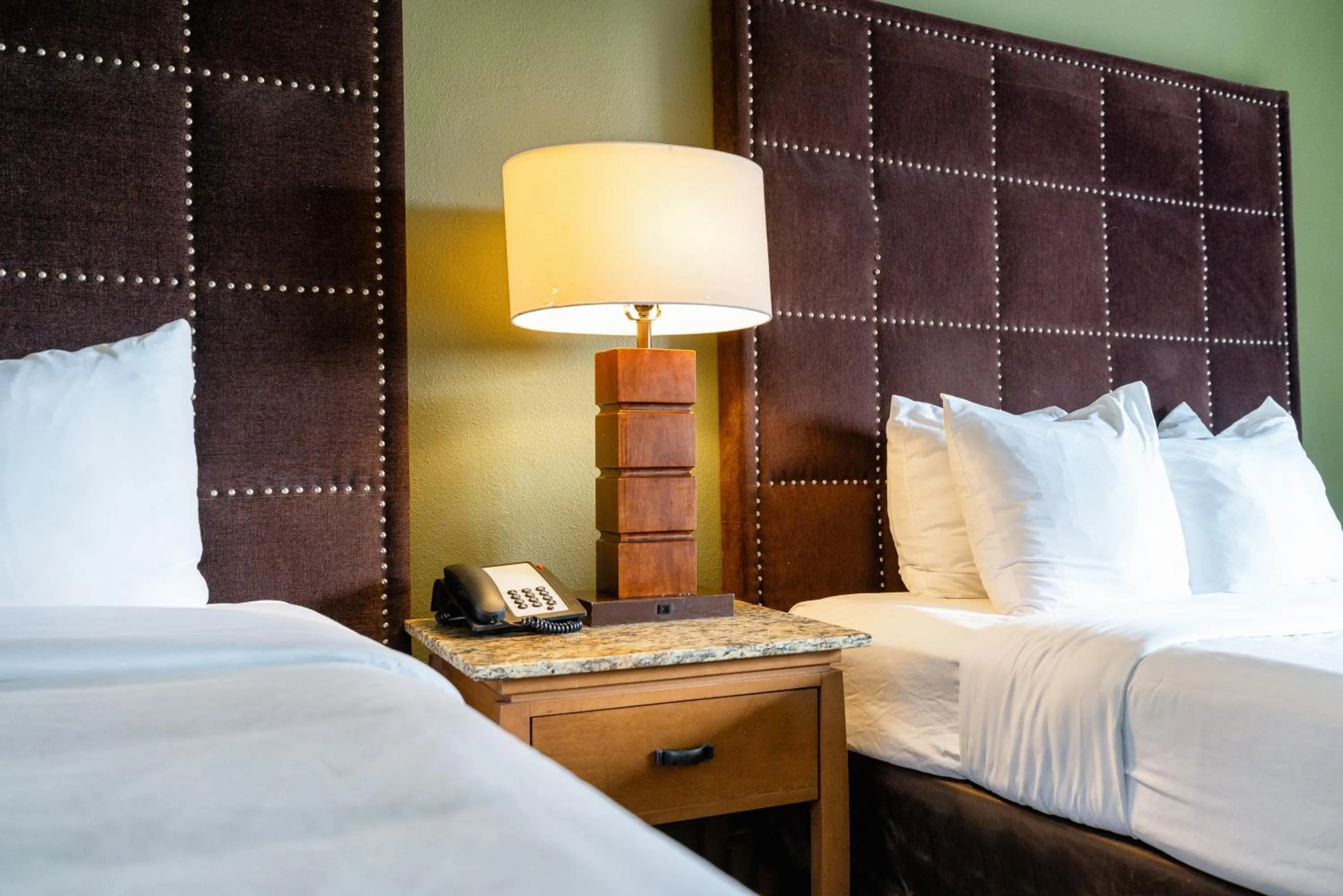 Bed in The Buena Park Hotel & Suites