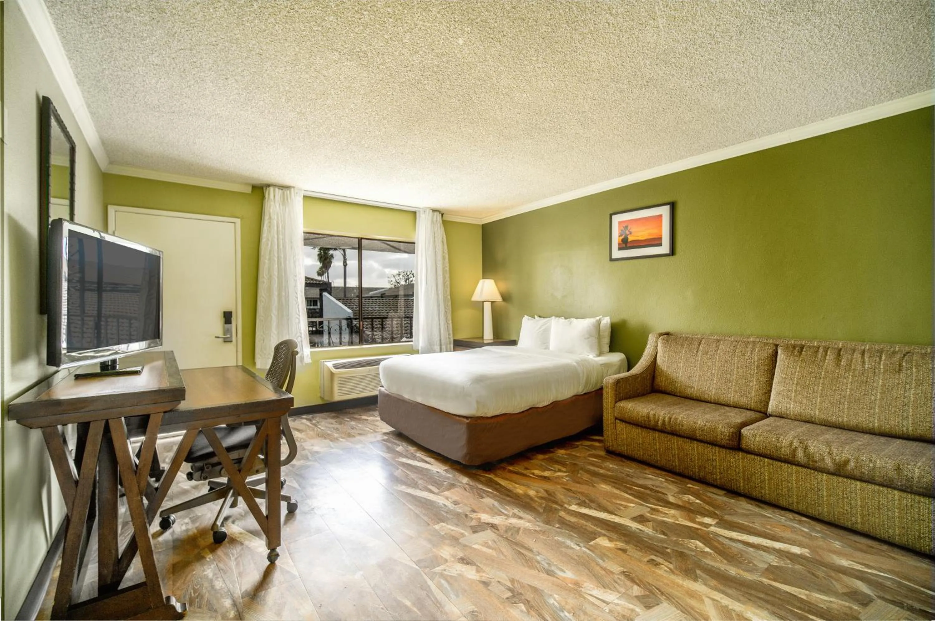 Bed in The Buena Park Hotel & Suites