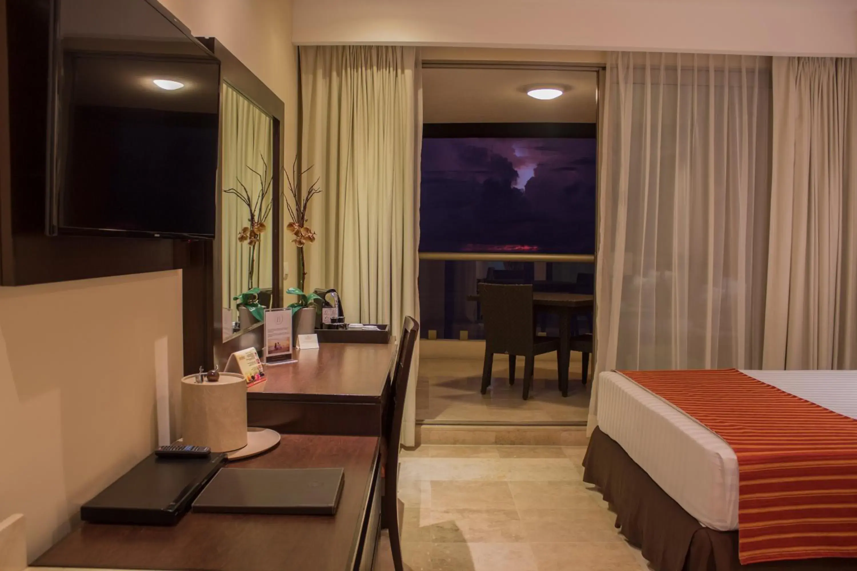 Toilet, Bed in Sunset Plaza Beach Resort Puerto Vallarta All Inclusive Toilet, Bed in Sunset Plaza Beach Resort Puerto Vallarta All Inclusive