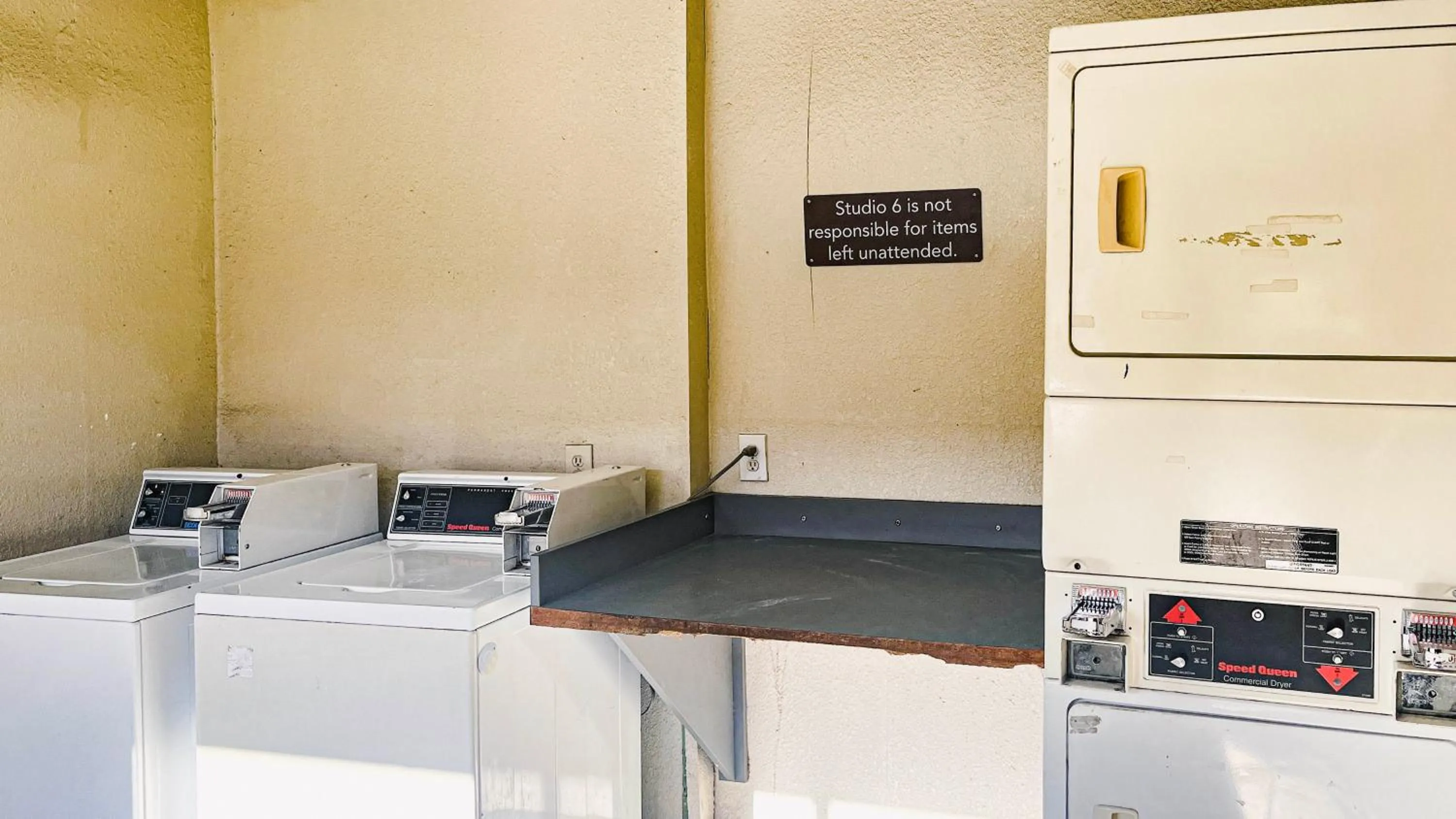 washing machine in Studio 6 Suites Dallas TX - Loop 12 West