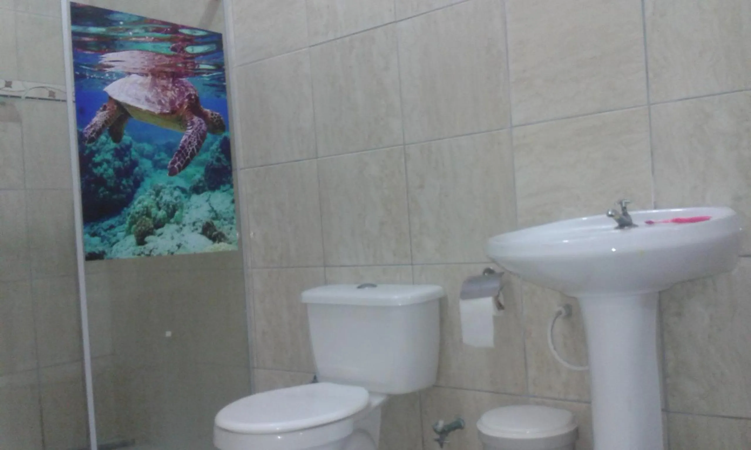 Photo of the whole room in Pousadinha Mangabeiras Familia e Grupos