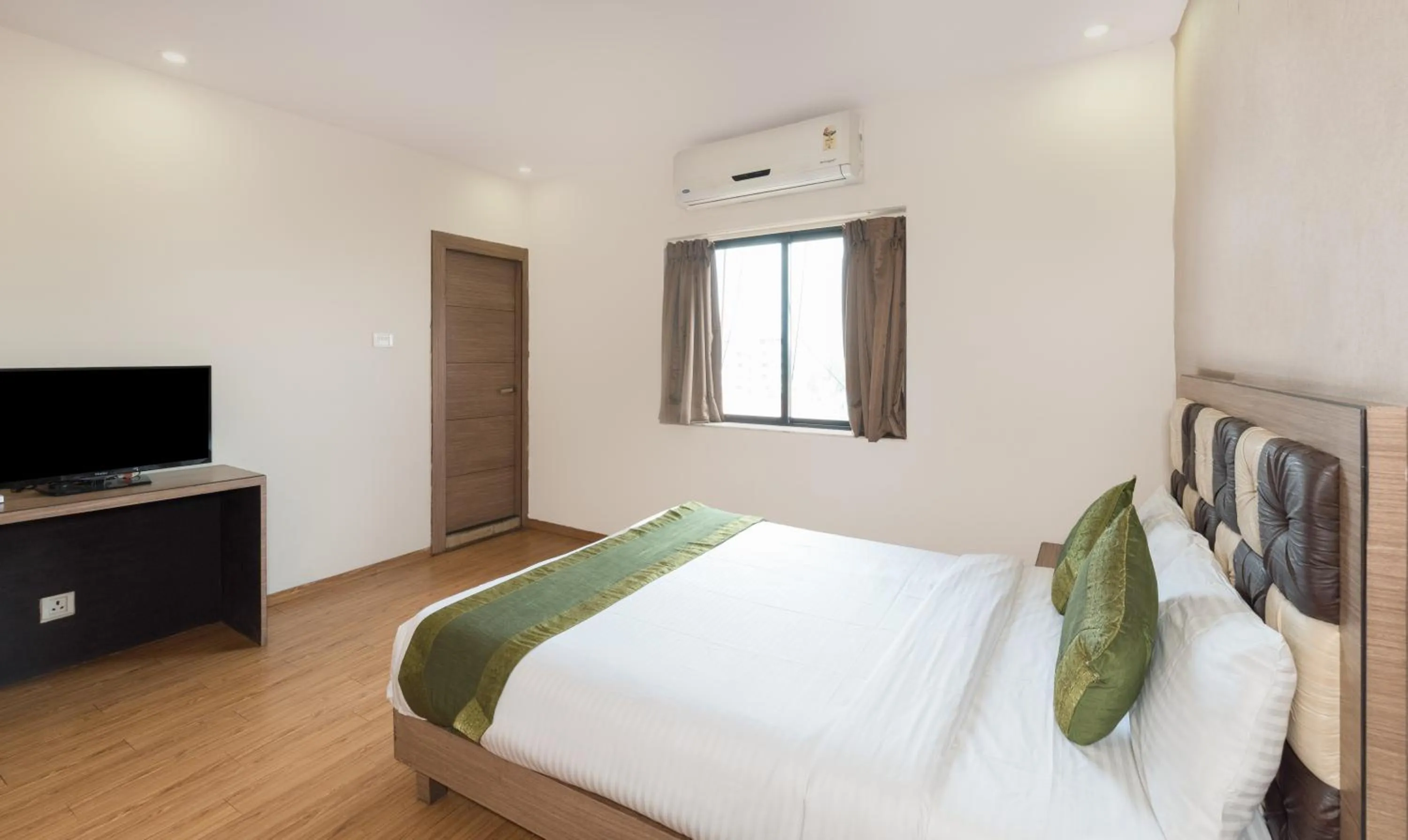 Bedroom in Treebo Pal Comfort