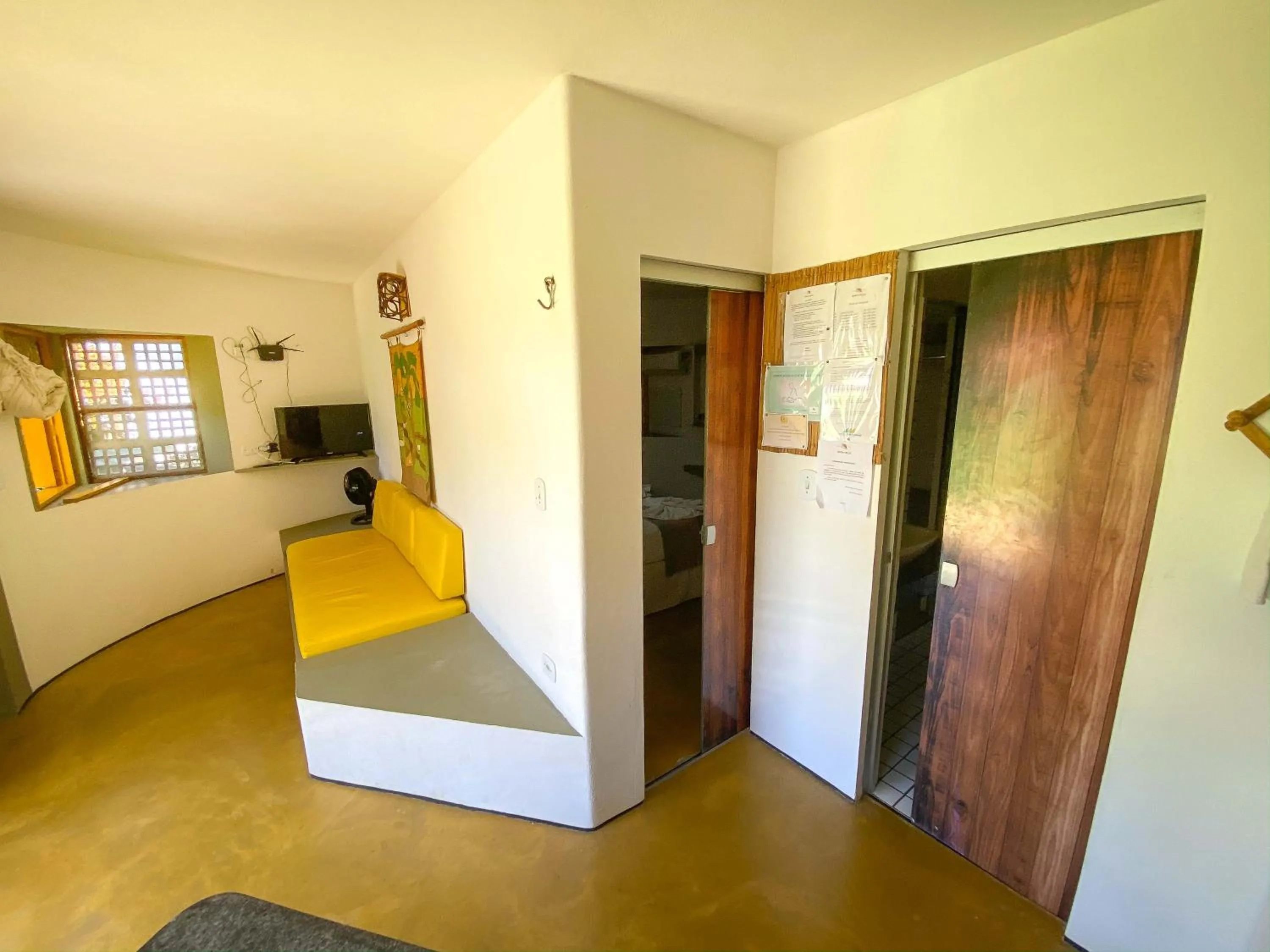 Living room, Bed in Pousada Barra Velha