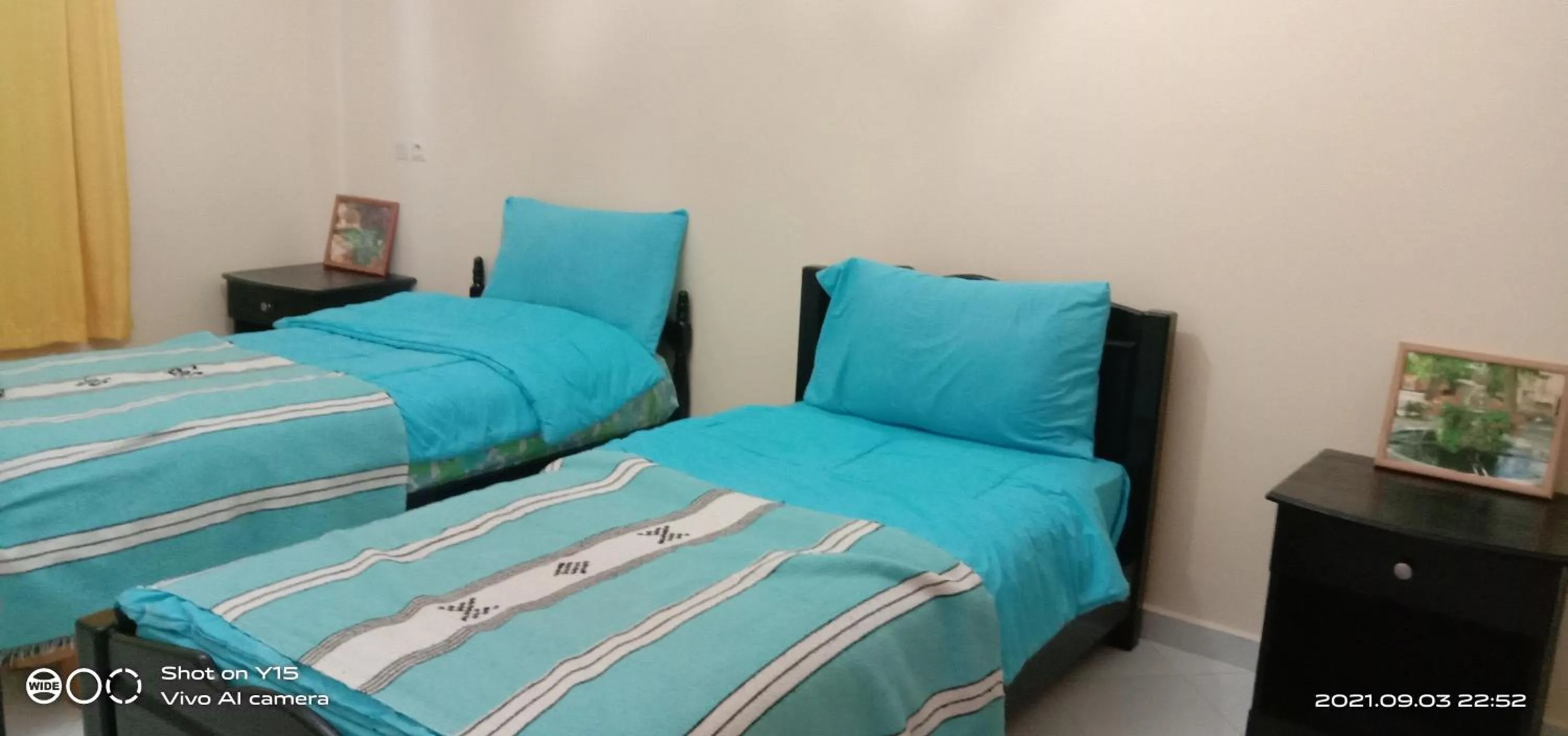 Bed in Blue Waves apartment