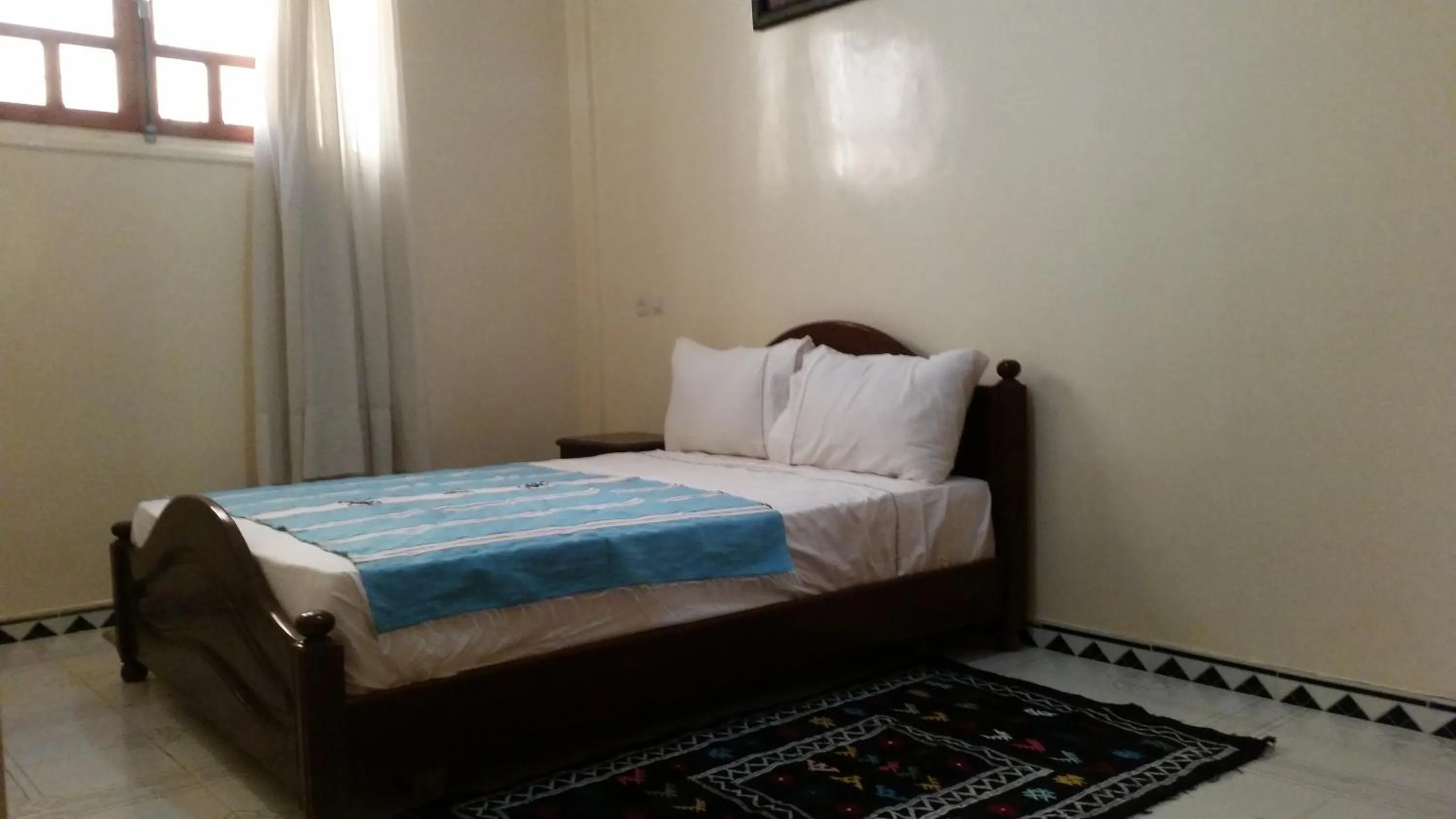 Bed in Blue Waves apartment