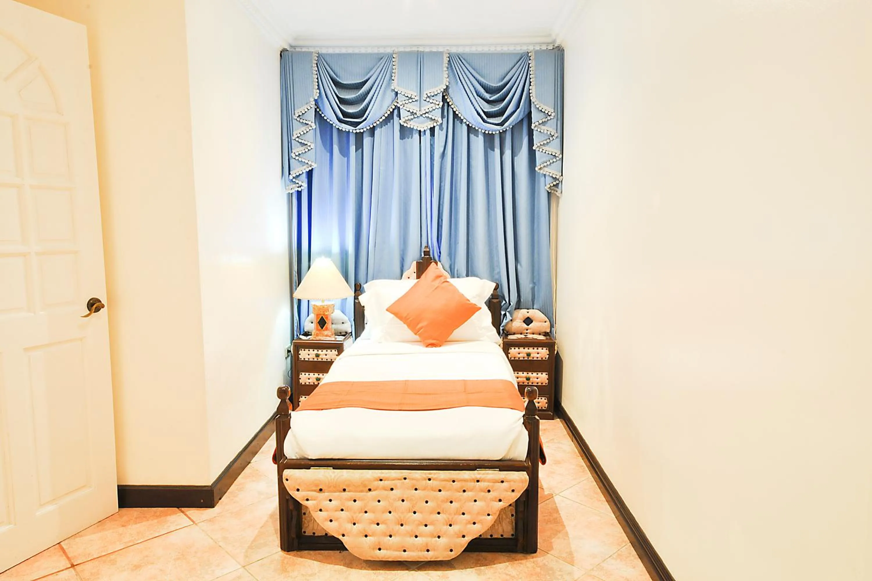 Photo of the whole room, Bed in Paradise Garden Hotel and Convention Center Boracay Powered by ASTON