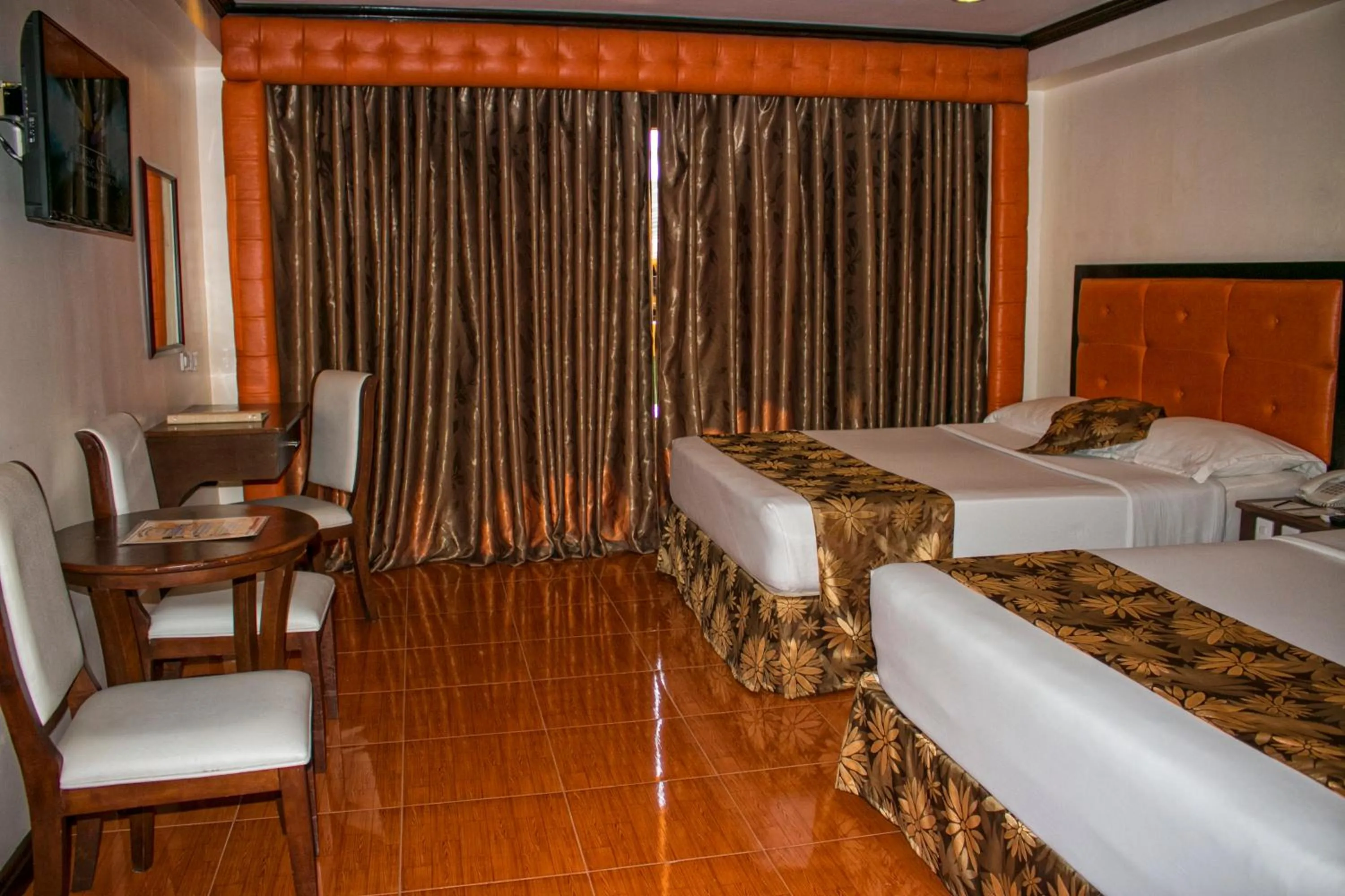 Photo of the whole room, Bed in Paradise Garden Hotel and Convention Center Boracay Powered by ASTON