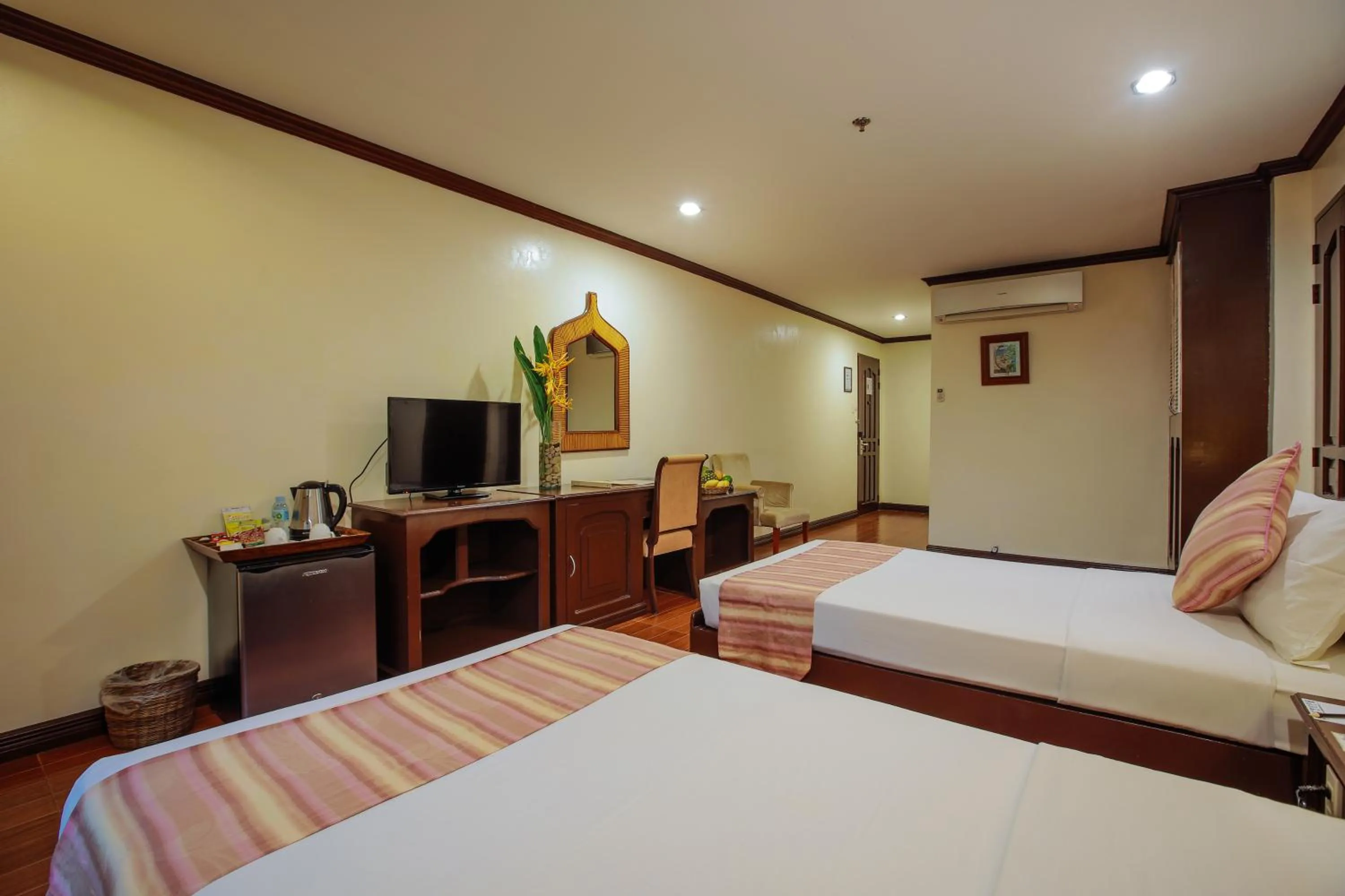 Photo of the whole room, Bed in Paradise Garden Hotel and Convention Center Boracay Powered by ASTON